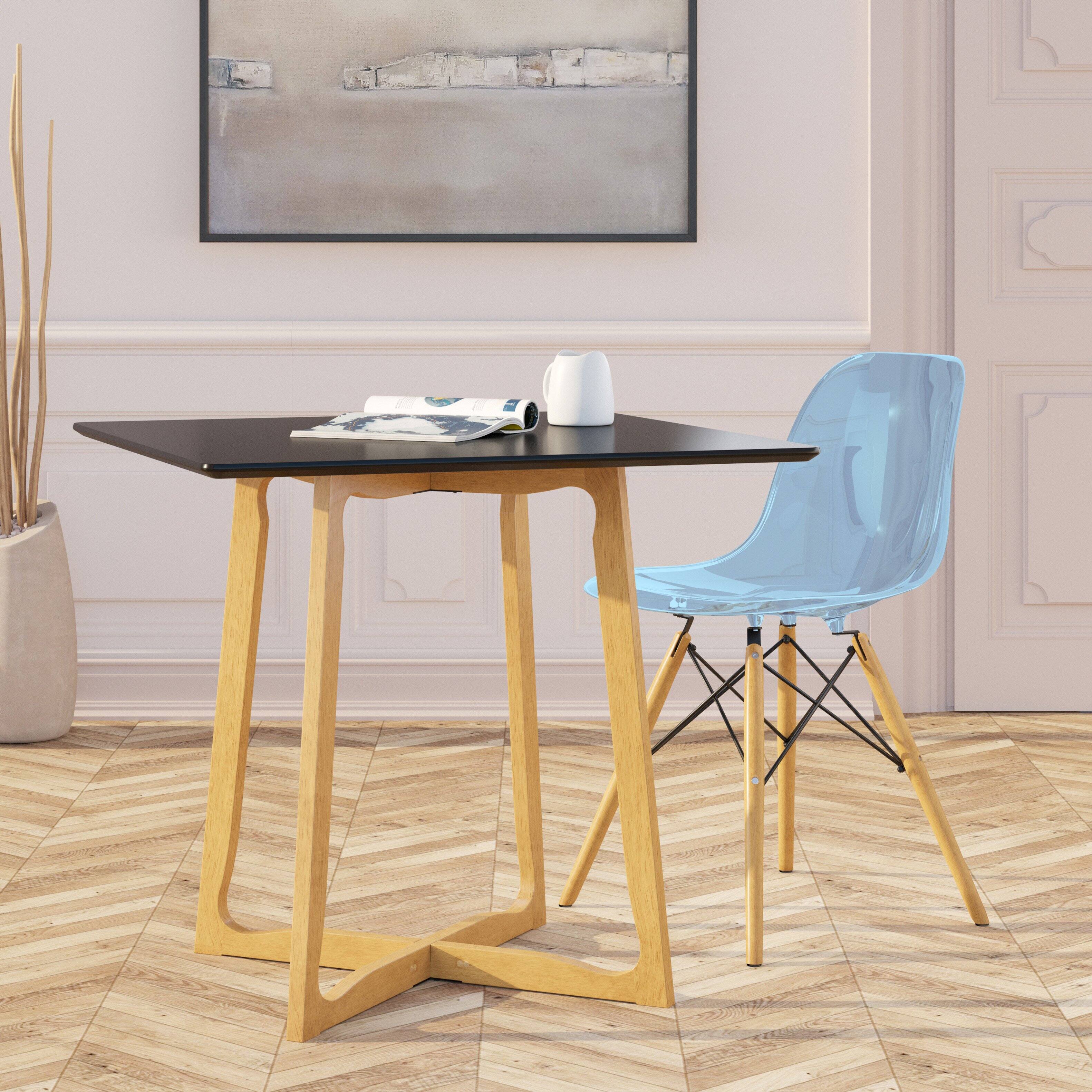 Left. LeisureMod - Dover Mid-Century Modern Dining Chair, ABS Plastic Seat with Wood Legs - Transparent Blue.