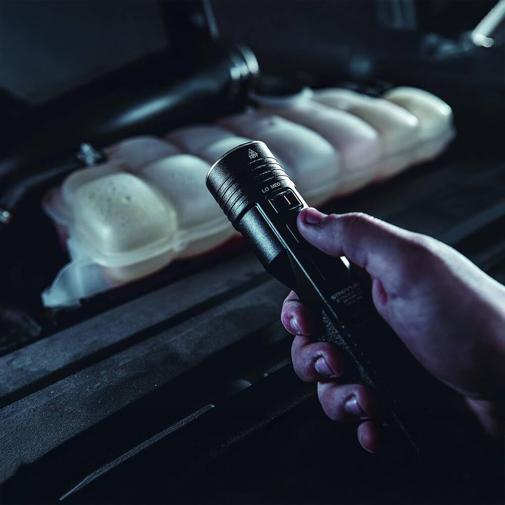 Angle. Streamlight - Streamlight 78104 Stinger 2020 Rechargeable Flashlight with 12V DC 1 Holder Charger, Black - Black.