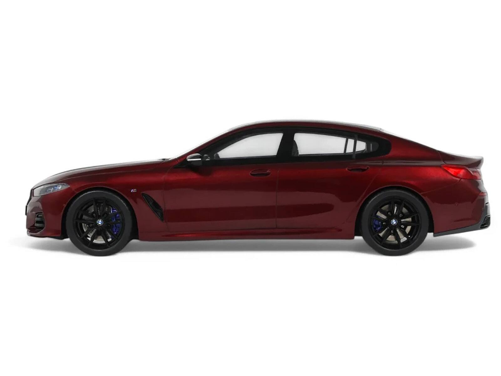 Back. GT Spirit - 2023 BMW M850I xDrive M Performance Aventurine Red with Carbon Top 1/18 Model Car by GT Spirit - Red with Carbon.