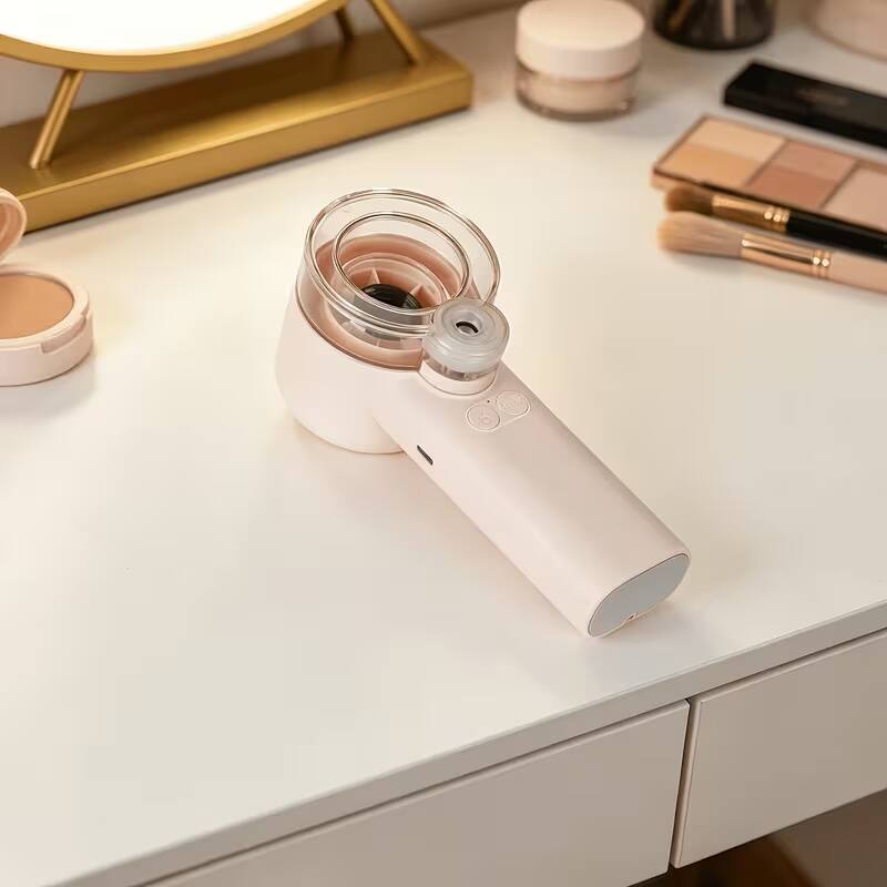Alt View 2. Oumilen - Handheld Misting Personal Fan, 3-Speed Rechargeable Mist Fan 2.04x2.04x6.02in, Pink for Outdoor Travel - Pink.