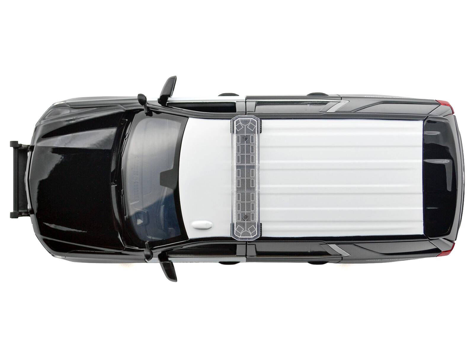 Alt View 5. Motormax - 2025 Chevrolet Tahoe Police Pursuit Vehicle "California Highway Patrol" Black and White 1/24 Model Car by Motormax.