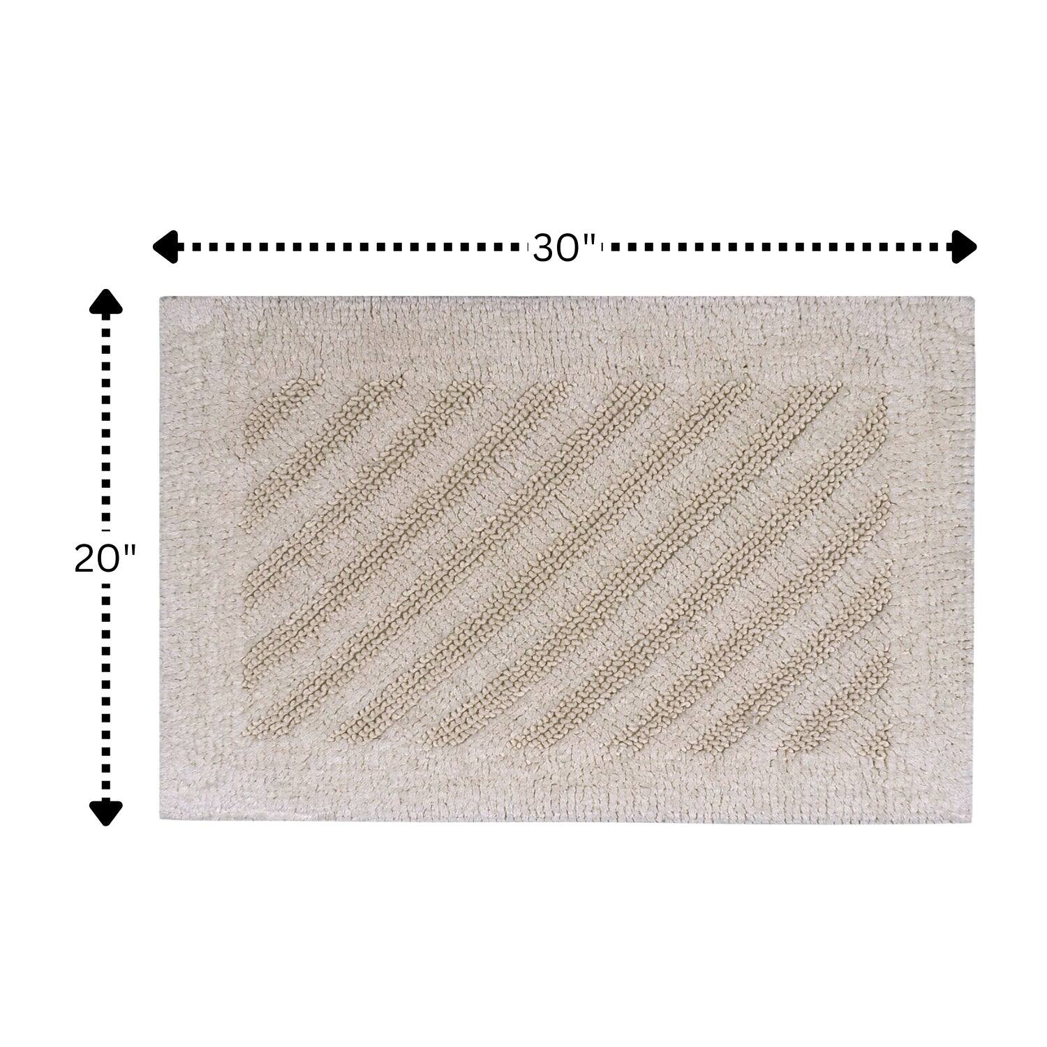 Left. Knightsbridge - Knightsbridge Ivory Shooting Star Reversible Bath Rug 20 x 30 - Ivory.