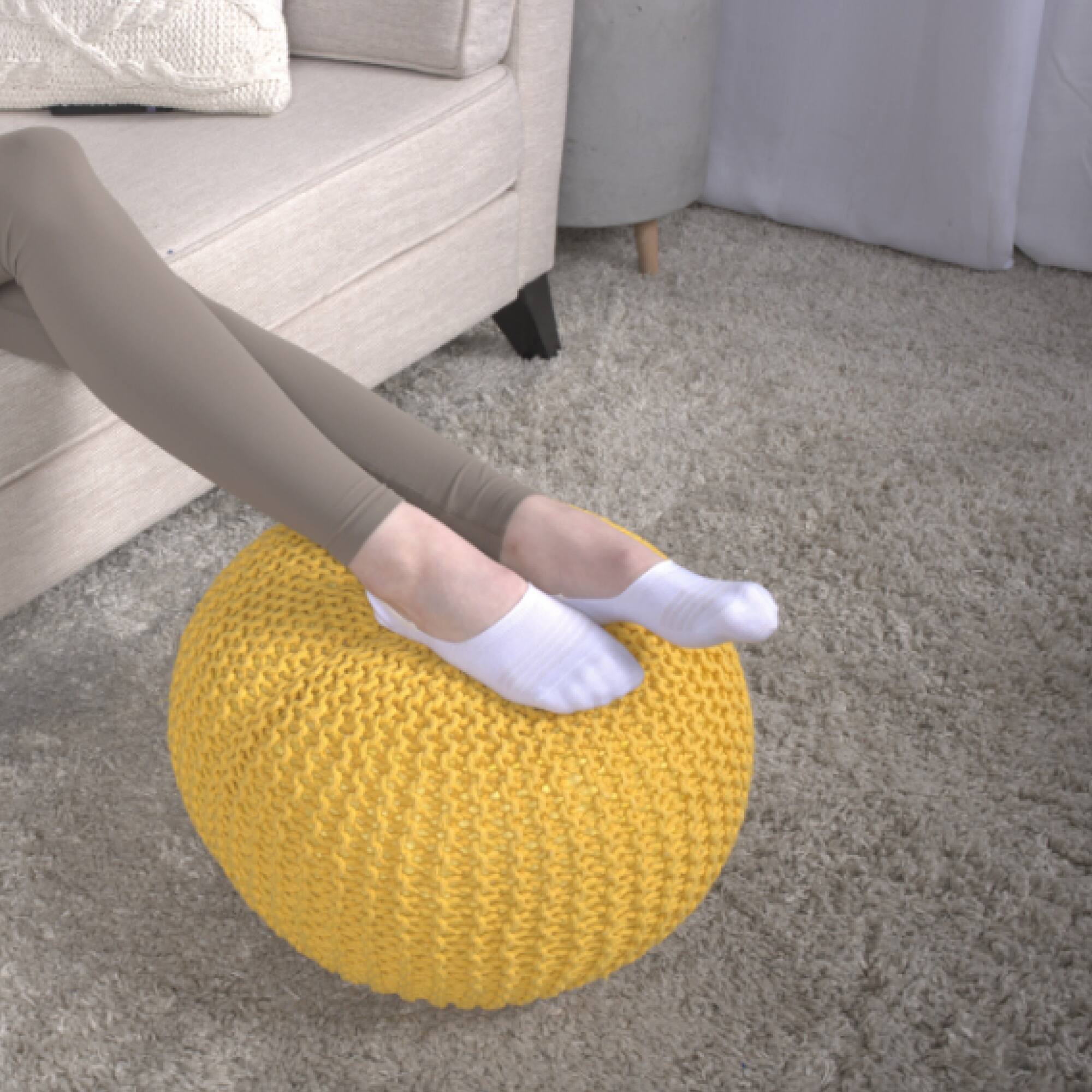 Left. GOODSILO - Stylish Knitted Cotton Round Pouf for Versatile Seating and Decor - Yellow.