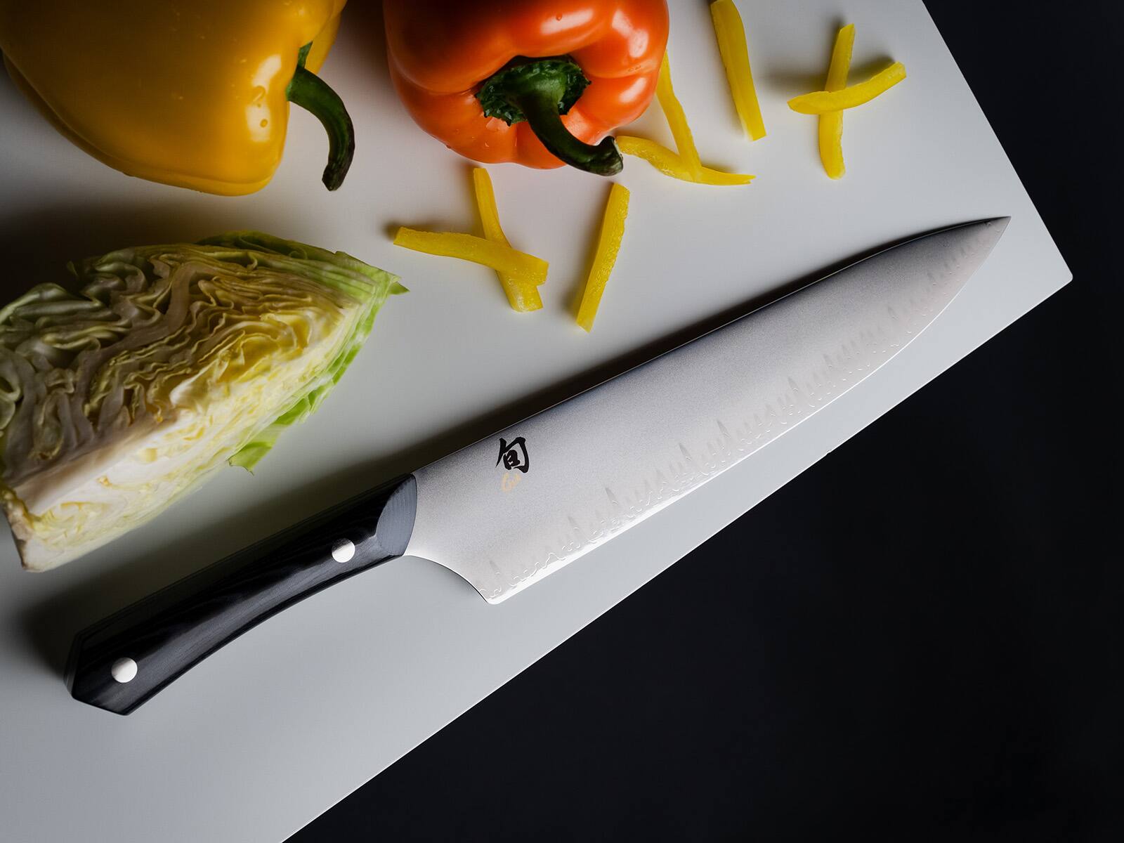 Alt View 3. Shun - Narukami 10 Inch Chef's Knife - Silver.