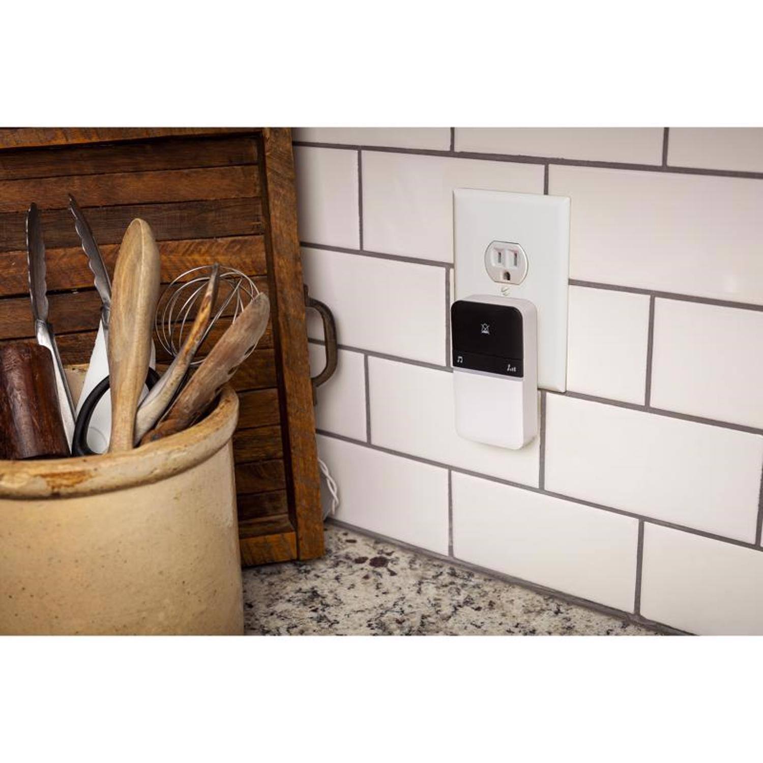 Left. HEATH ZENITH - Heath Zenith Piezo Black/White Plastic Wireless Door Chime Bell.