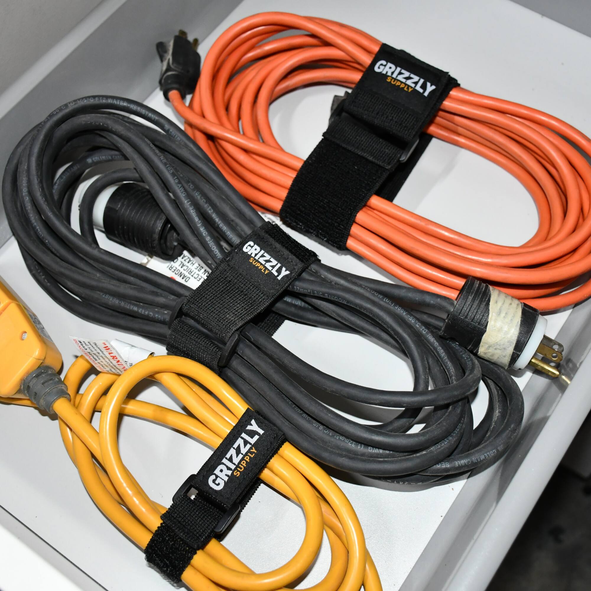 GRIZZLY SUPPLY  
WE HAZA ALAMETSAC  
SICOOW  
WOOSIE  
GRIZZLY DANGER  
ECTRICAL  
NBE 75 12  
SUPPLY  
SIOGA  
MN  
L 20000  
ENARIC  
RO  
NSE  
- Daam  
GRIZZLY SUPPLY  
CABLE