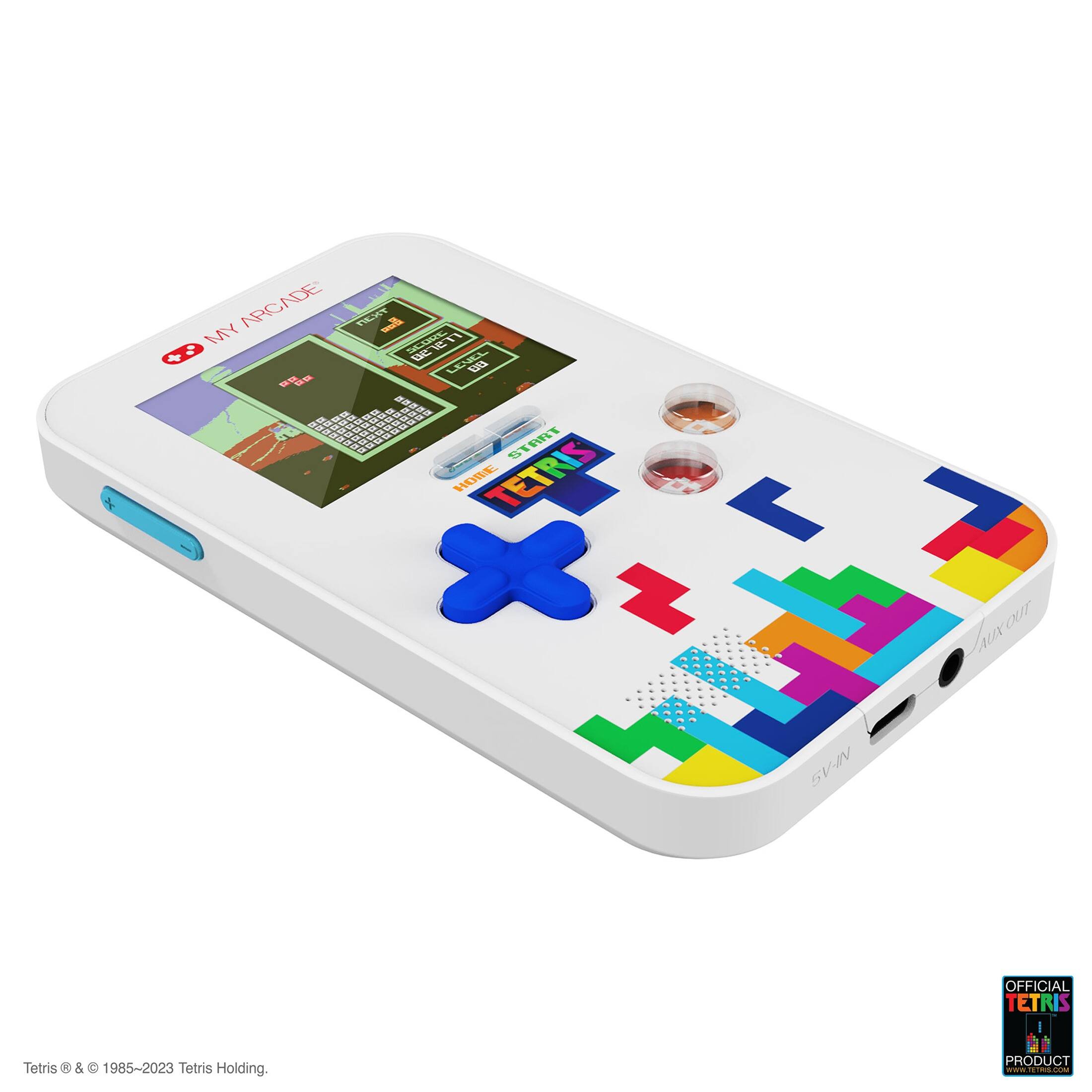 The image features a white cell phone with a Tetris theme. It is an official Tetris product, and the phone is designed to look like a game controller. The phone's screen displays the Tetris game, and it is equipped with buttons for gameplay. The product is a collaboration between Tetris Holding and TecToy, and it is available in various colors. The image showcases the phone's design and the Tetris game, highlighting the nostalgic and fun aspect of the product.