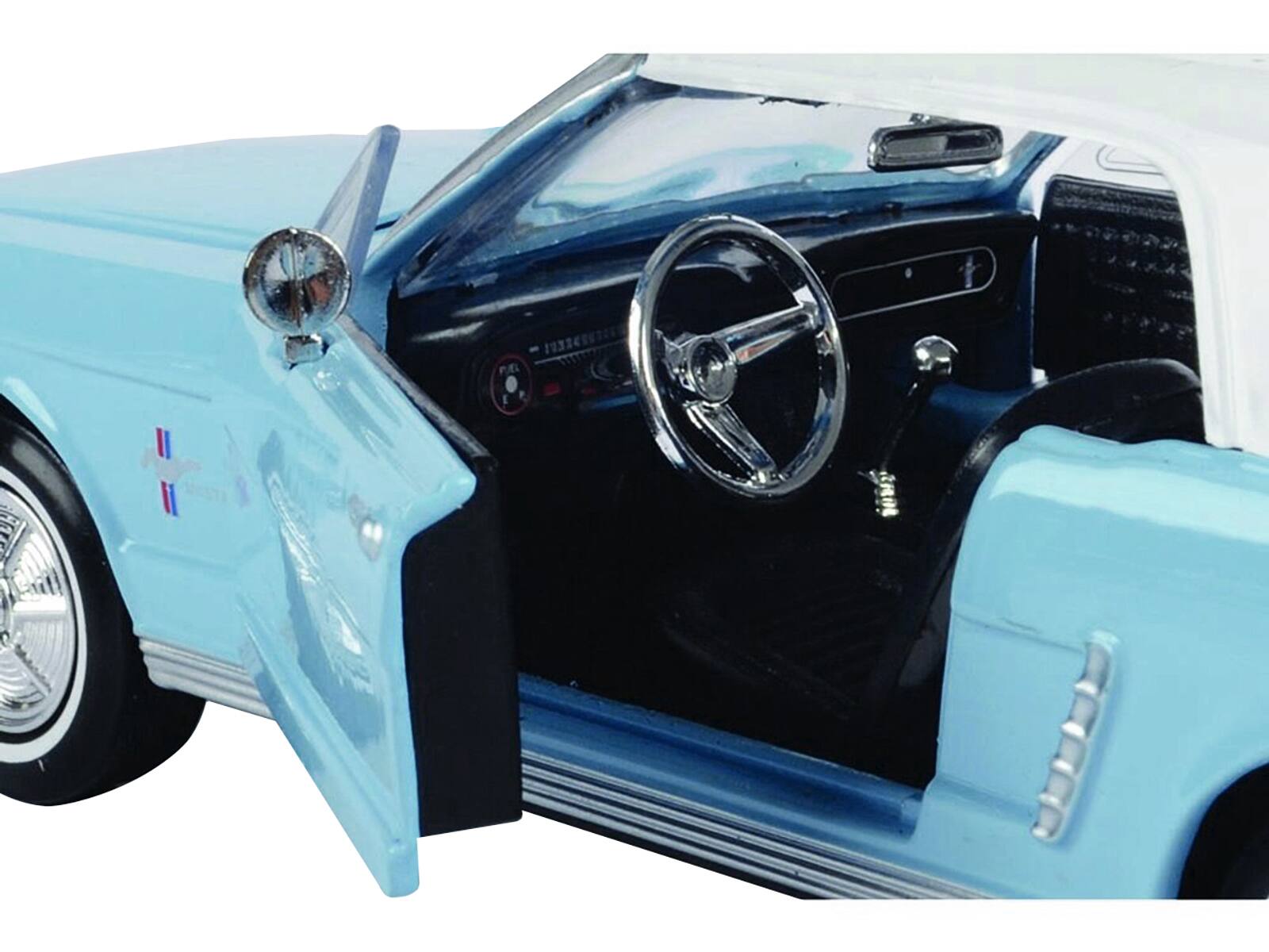 Angle. Motormax - 1964 1/2 Ford Mustang Light Blue White Top James Bond 007 Thunderball Movie James Bond Collection Series 1/24 - Light Blue With White.