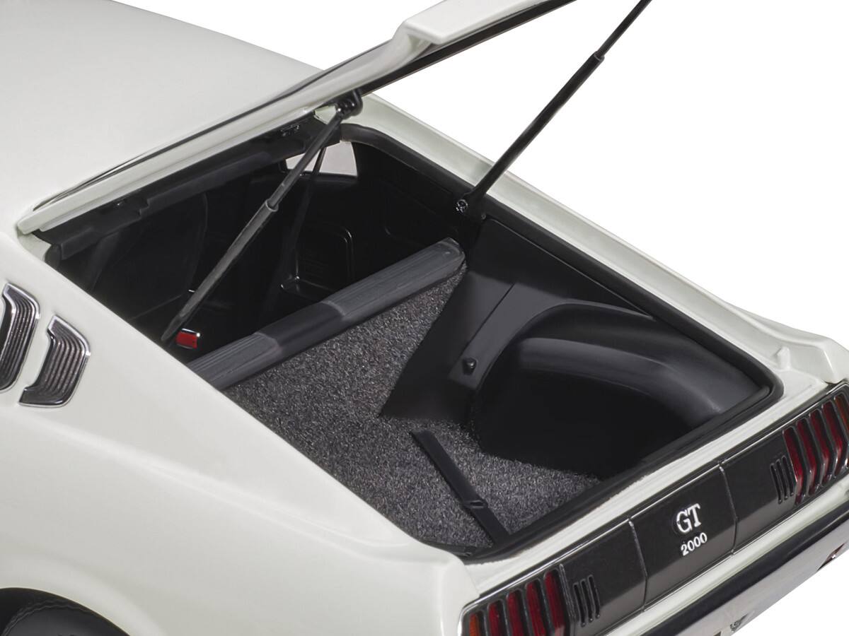 Left. Autoart - 1973 Toyota Celica Liftback 2000GT (RA25) RHD (Right Hand Drive) White with Red and Black Stripes 1/18 - White With Red And Black.