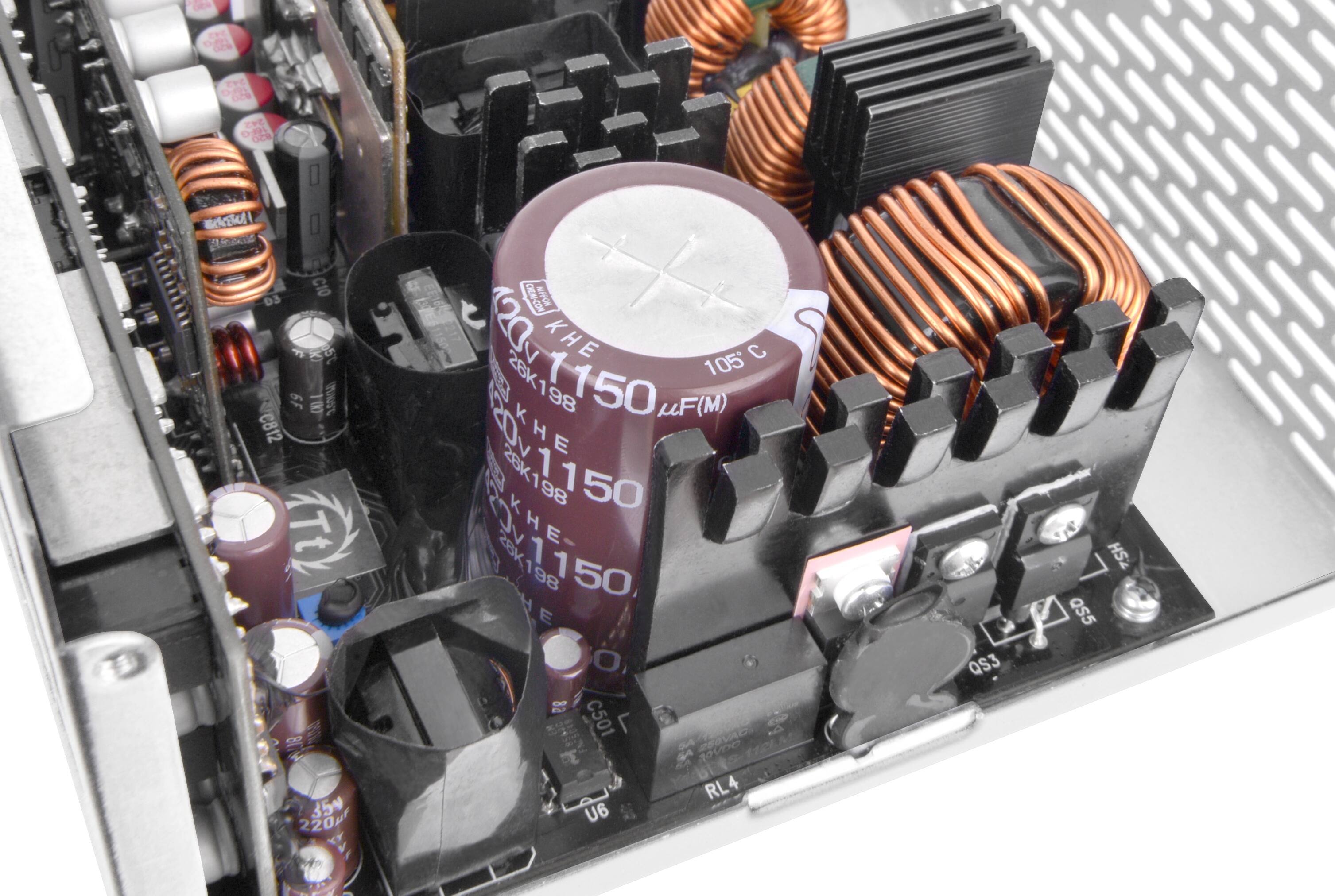 The text on the image reads:

"EVE 2 eso d C10 D3 x 19 6F 100 1.00L C812 Tt 18 e 87 354 220p KY Y u I 120 KHE 105 C A 26K198 1150 K MF(M) 20v KHE 8 28K198 1150 98  28K1 KHE- 11 98 150 E O DO C501 PEOVAD 190p0 120 RL4 U6 QS3 HS2 as5"

It appears to be a collection of random numbers and letters, possibly related to the electronic components in the image.