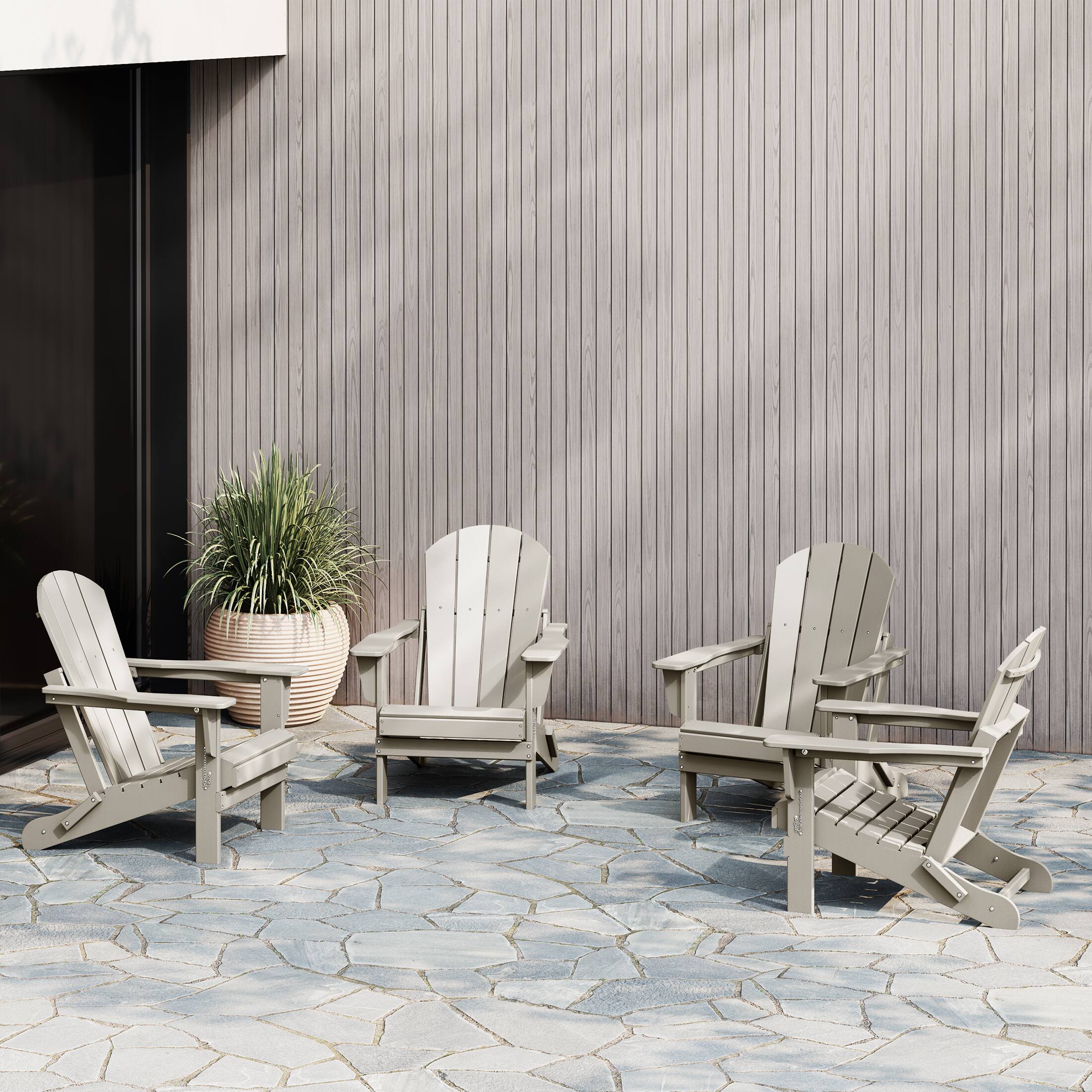 Angle. WestinTrends - WestinTrends Malibu Outdoor HDPE Folding Poly Adirondack Chairs (Set of 4) - Sand.