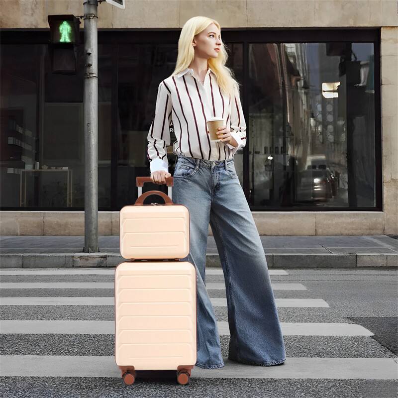 Alt View 4. HTUTWOO - 14"/20" Set of 2 ABS Spinner Wheel Luggage with Combination Lock - 360° Rotating Handle, Anti-Fall Protective Cover - Beige.