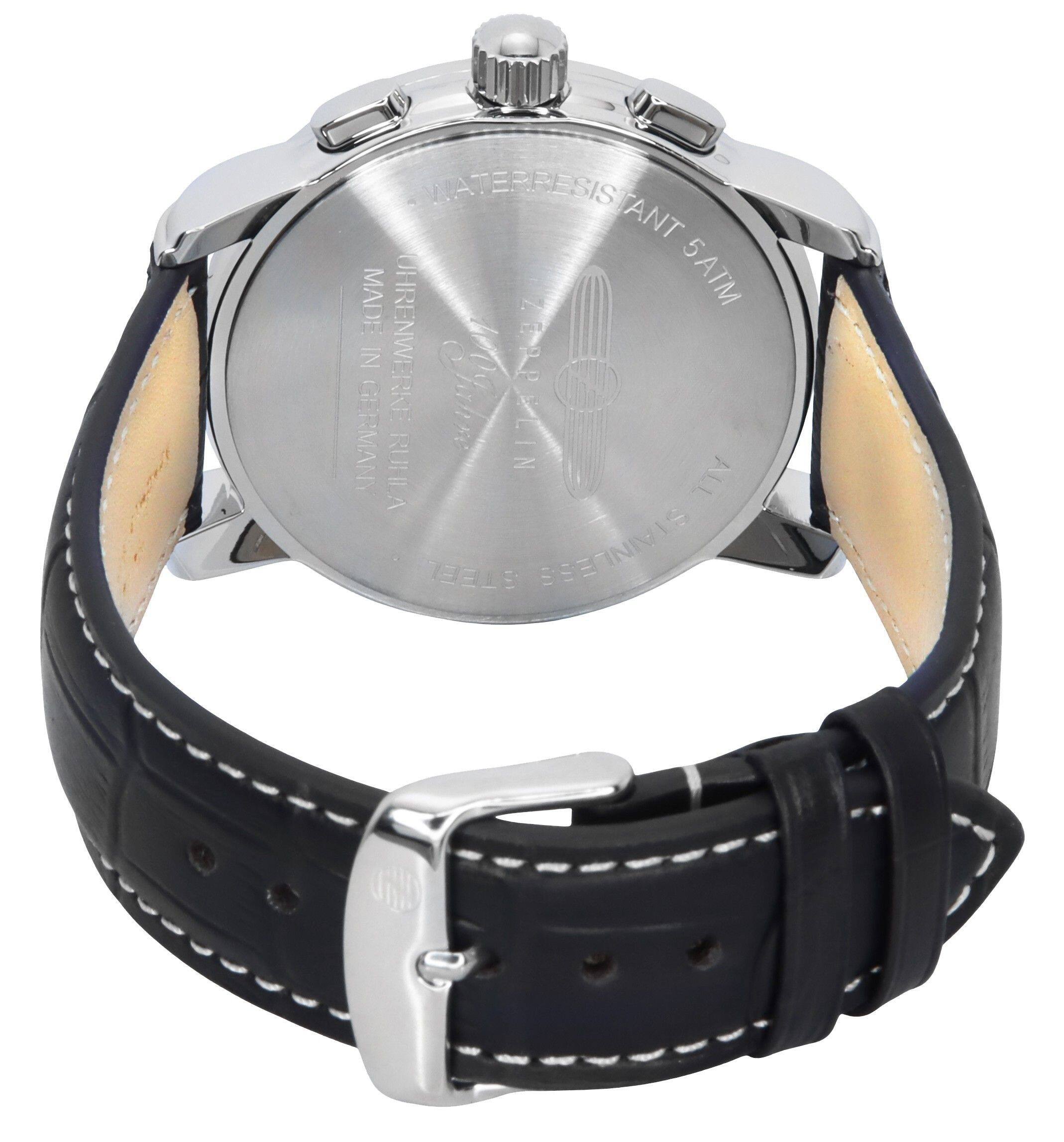 WATER RESISTANT  
MADE IN GERMANY  
UHRENWERKE RULLA  
10 ATM  
MADE IN GERMANY  
17 JEWELS  
SWISS MADE