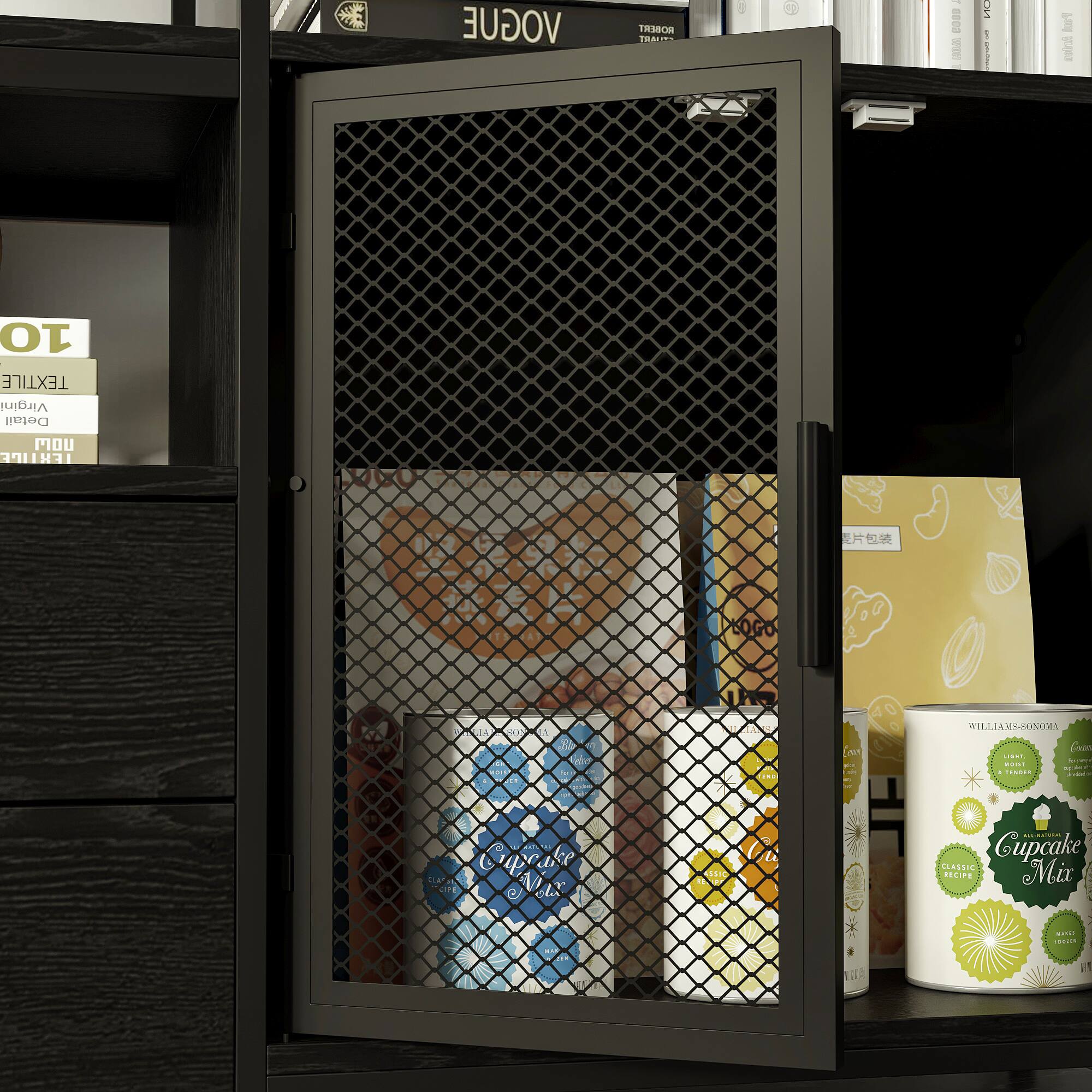 The image shows a bookshelf with a black door that has a wire mesh design. The door is open, revealing a collection of books and magazines. There are several books of different sizes and colors, as well as a few magazines, including a Vogue magazine. The books are organized neatly on the shelves, creating an organized and visually appealing display.