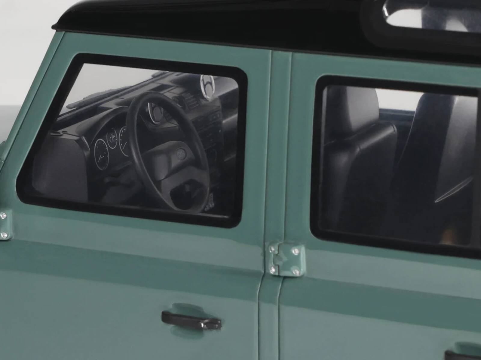 Alt View 1. GT Spirit - 2016 Land Rover Defender 3 Station Wagon Green with Black Top 1/18 Model Car by GT Spirit.