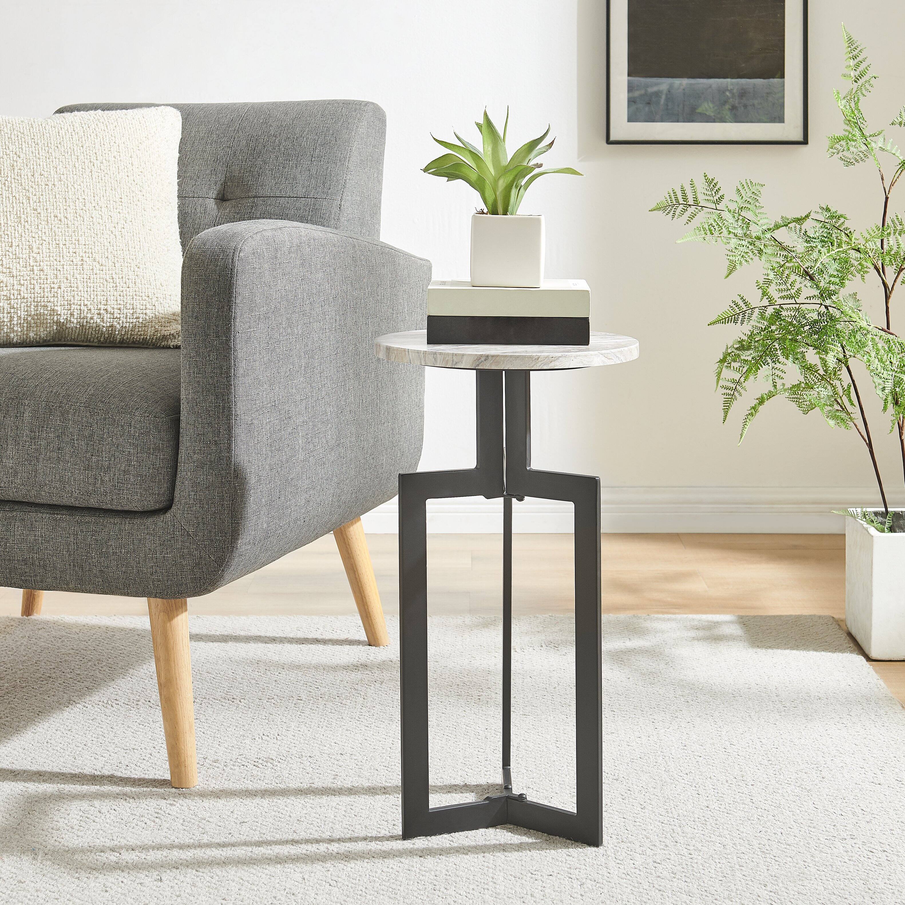 Angle. Danya B - Black Metal Sculptural Pedestal & Faux Stone Tabletop Accent End Table - Black, White Marble.
