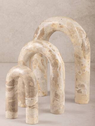 Front. GAURI KOHLI - Jubilant Decorative Objects - Shades of brown and beige.