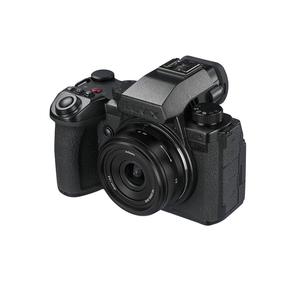 LUMIX 18 1 17% 8 Artisans  
SSIN  
1:5.6 18mm  
NO. 49 Ero 500000 00005  
0.3