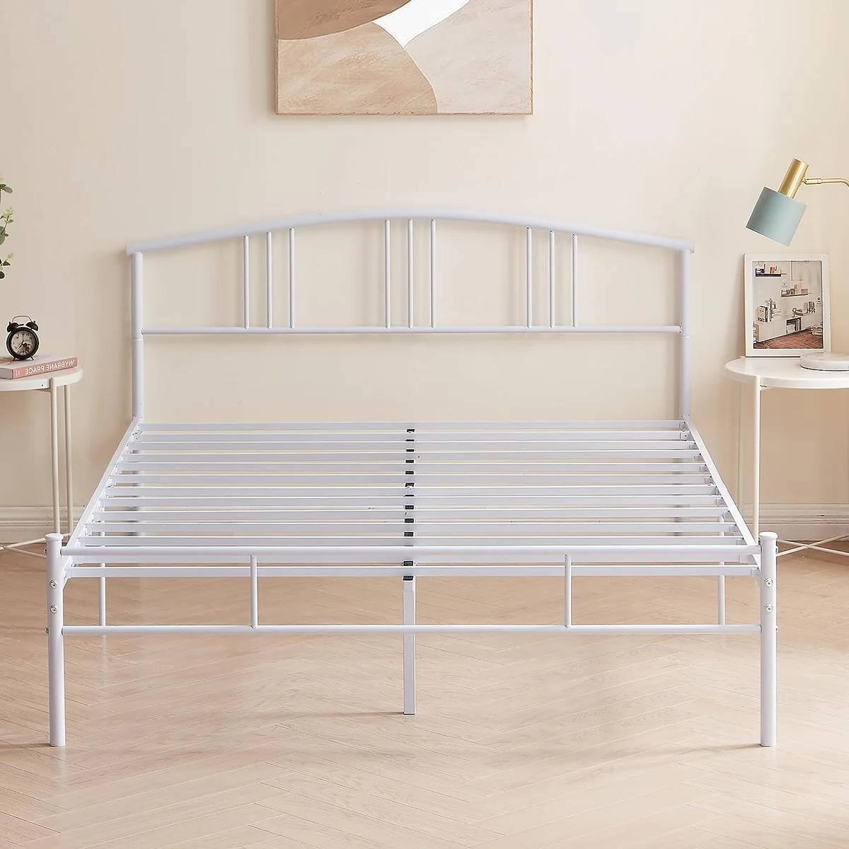 The text "x 20AR ARETI PRACE" is not present in the image. The image shows a white metal bed frame with no visible text.