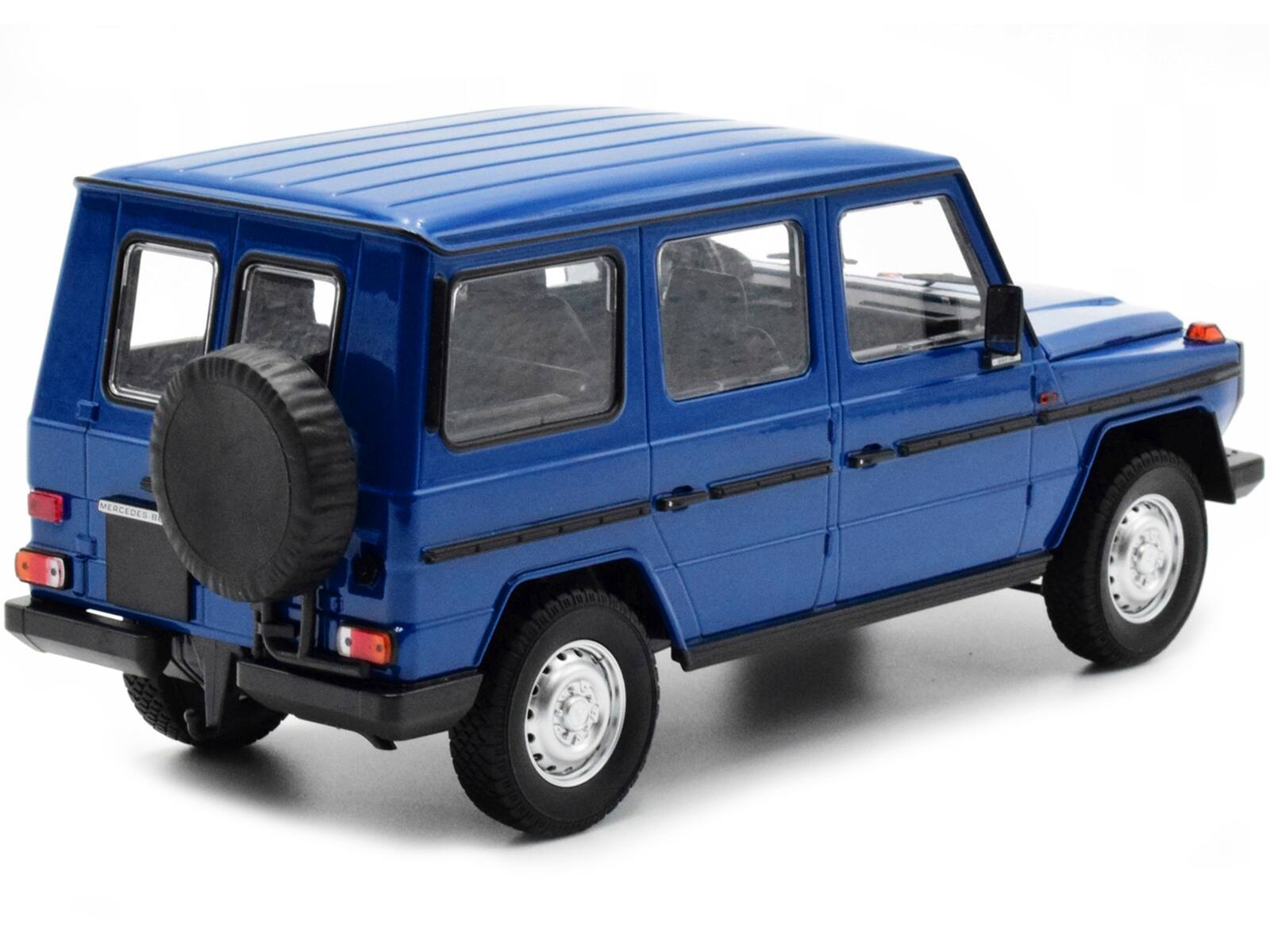 Left. Minichamps - 1980 Mercedes-Benz G-Model (LWB) Dark Blue with Black Stripes Limited Edition to 402 pieces Worldwide 1/18 & - Dark Blue with Black.