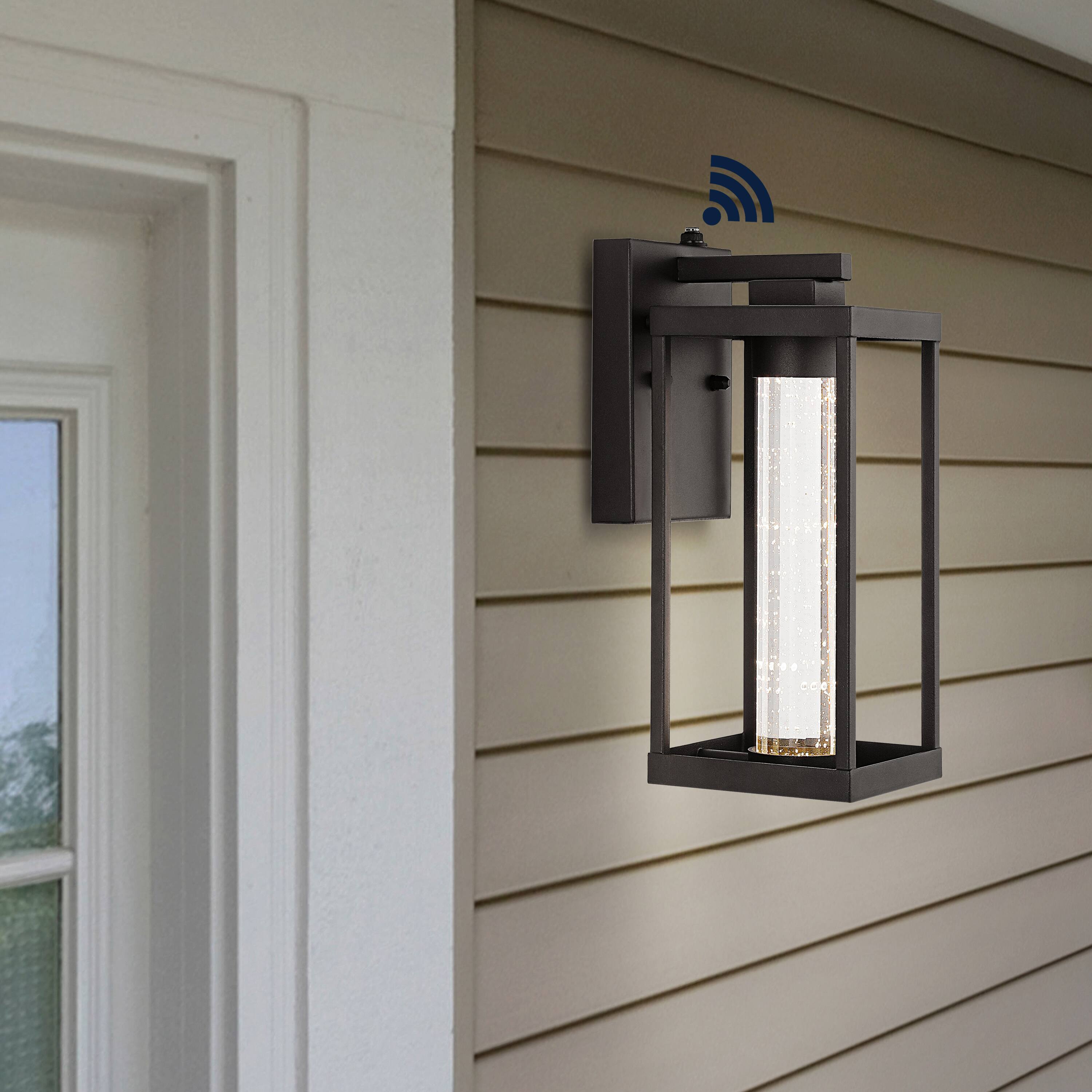 Alt View 9. Jonathan Y - Juno 4.75" 1-Light Industrial Vintage Iron/Seeded Glass with Dusk-to-Dawn Sensor Integrated LED Outdoor Sconce, Black - Black.