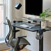Front. Branch Furniture - Duo Standing Desk 36" – Adjustable Desk with OLED Control Panel, Frameless Design & Compact Footprint - Charcoal / Charcoal.