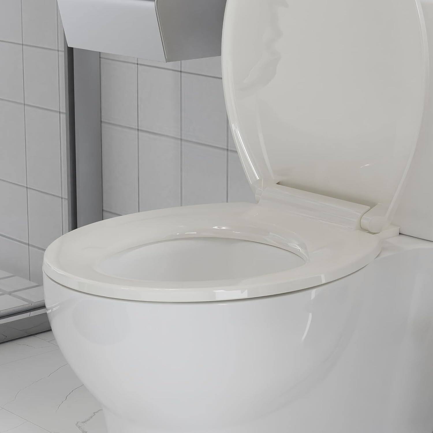 Left. Jojoka - Toilet Seat Elongated Toilet Seat with Slow Close Easy Clean Easy Installation - Off-white.