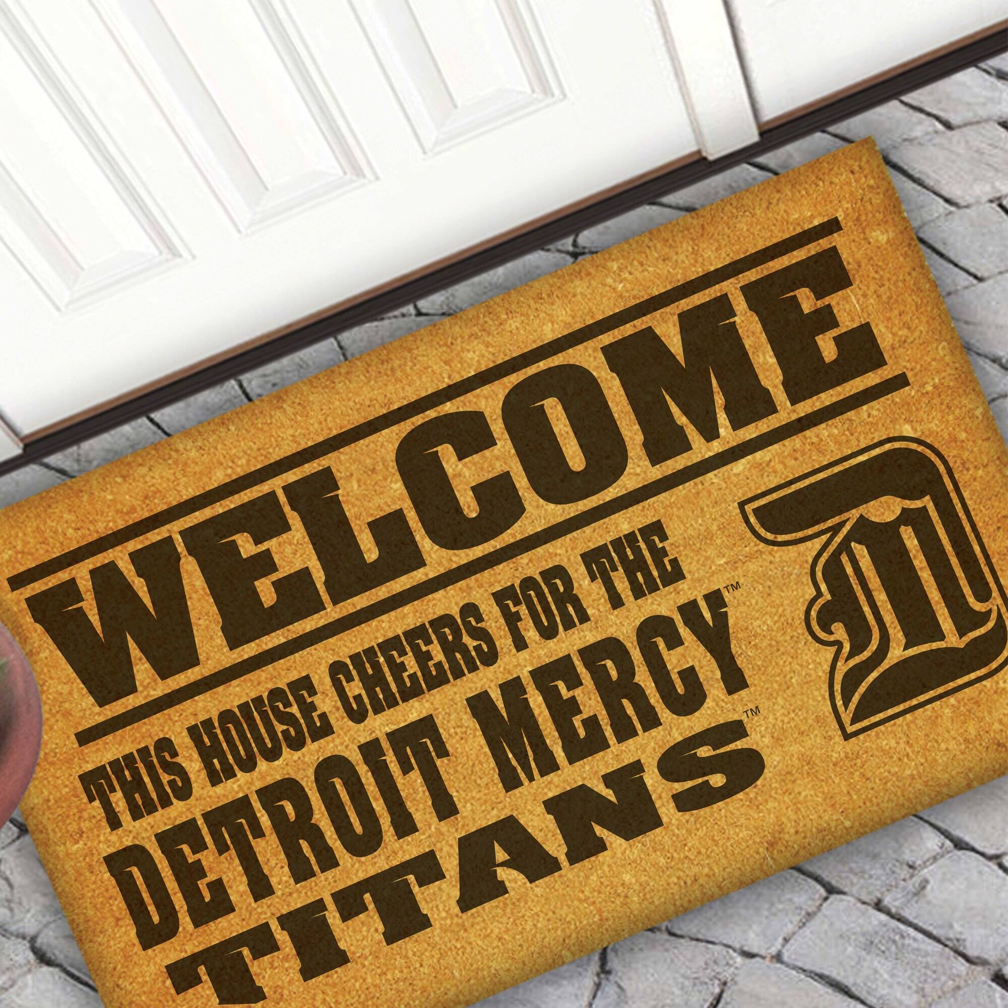 WELCOME  
THIS HOUSE CHEERS FOR THE  
DETROIT MERCY  
TITANS