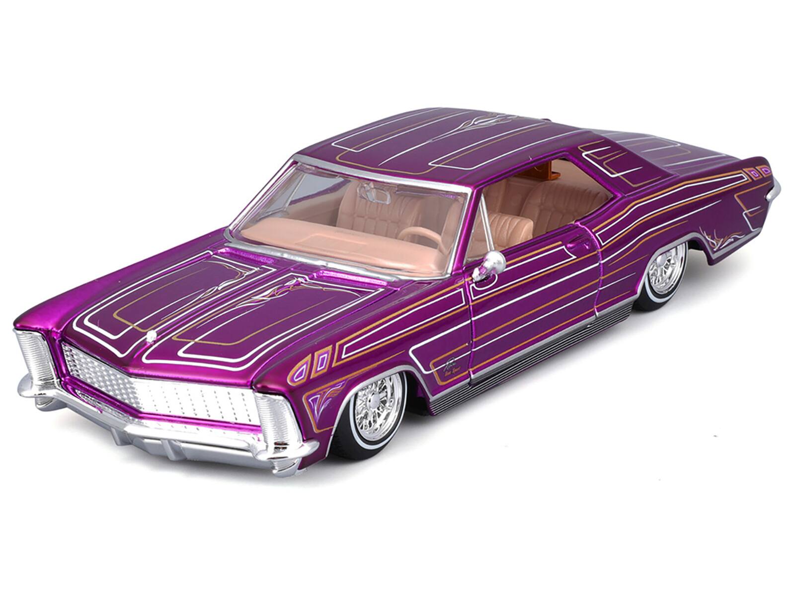 Angle. Maisto - 1965 Buick Riviera Lowrider Purple Metallic with Graphics "Lowriders" Series 1/26 Diecast Model Car by Maisto - Purple Metallic.