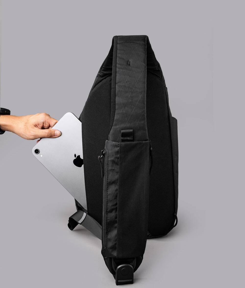 Back. ALPAKA - Crossbody Sling Bag 7.5L (Left Shoulder) for Men, Fits 11" Tablet, Phone Sleeve, Bottle Pocket, Luggage Pass-Through - Black X-Pac VX42.