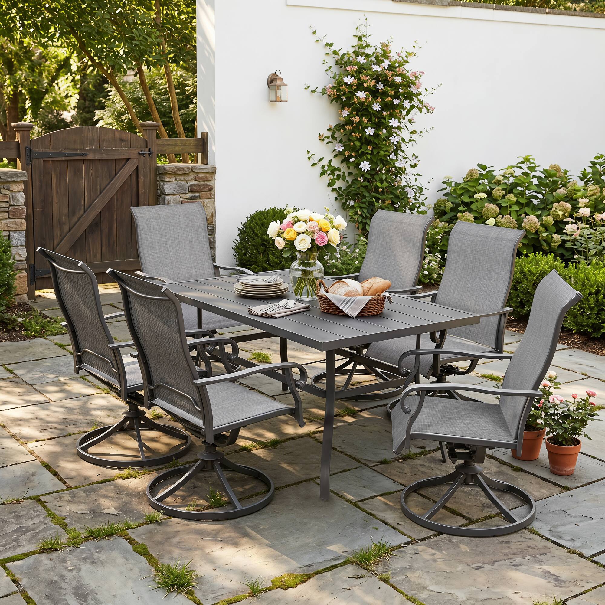Angle. Nuu Garden - 7-Piece Outdoor Dining Set with Umbrella Hole, Textilene Swivel Chairs - Gray.