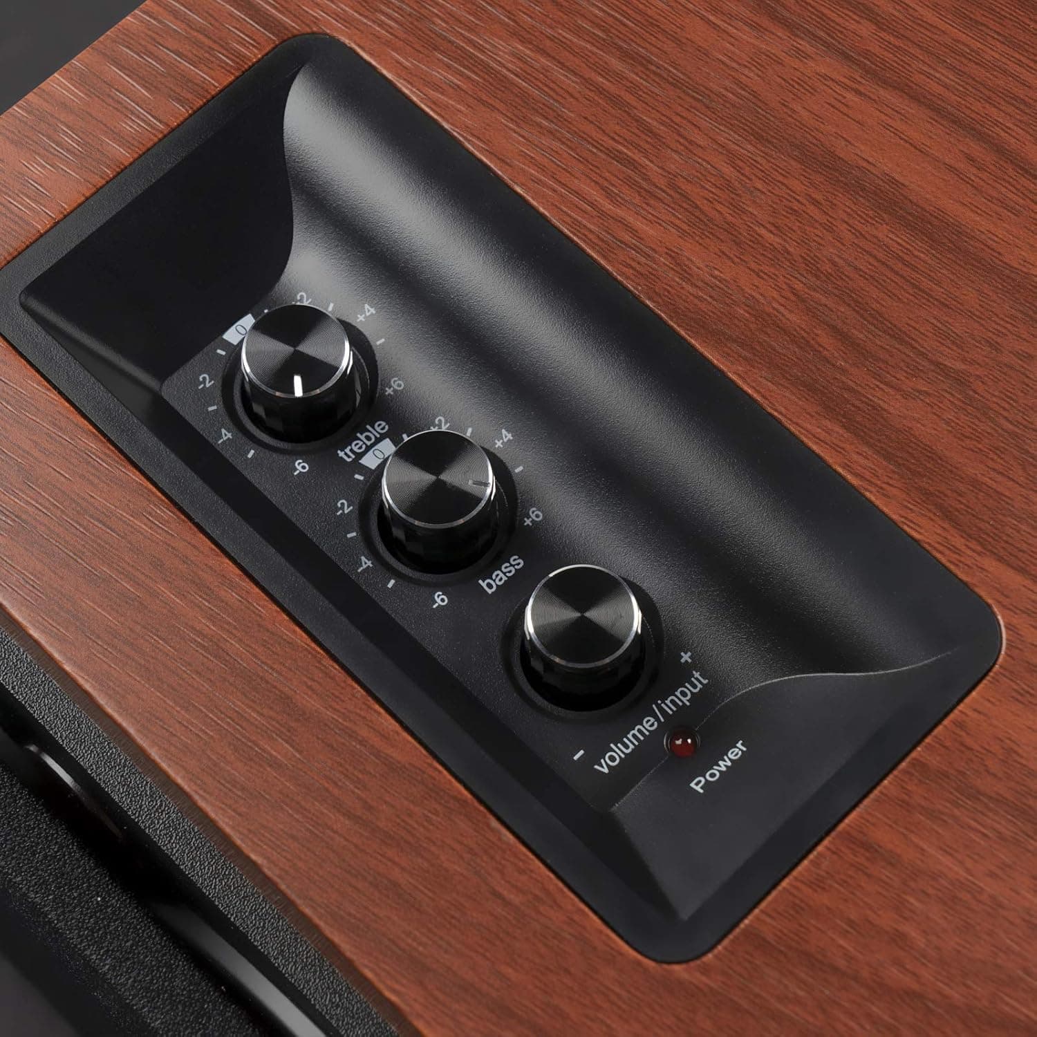 The text on the image reads:
0 - -2 - -4 2 I +4 +6 treble -6 - -4 I 2 -6 +4 +6 bass + input I volume Power