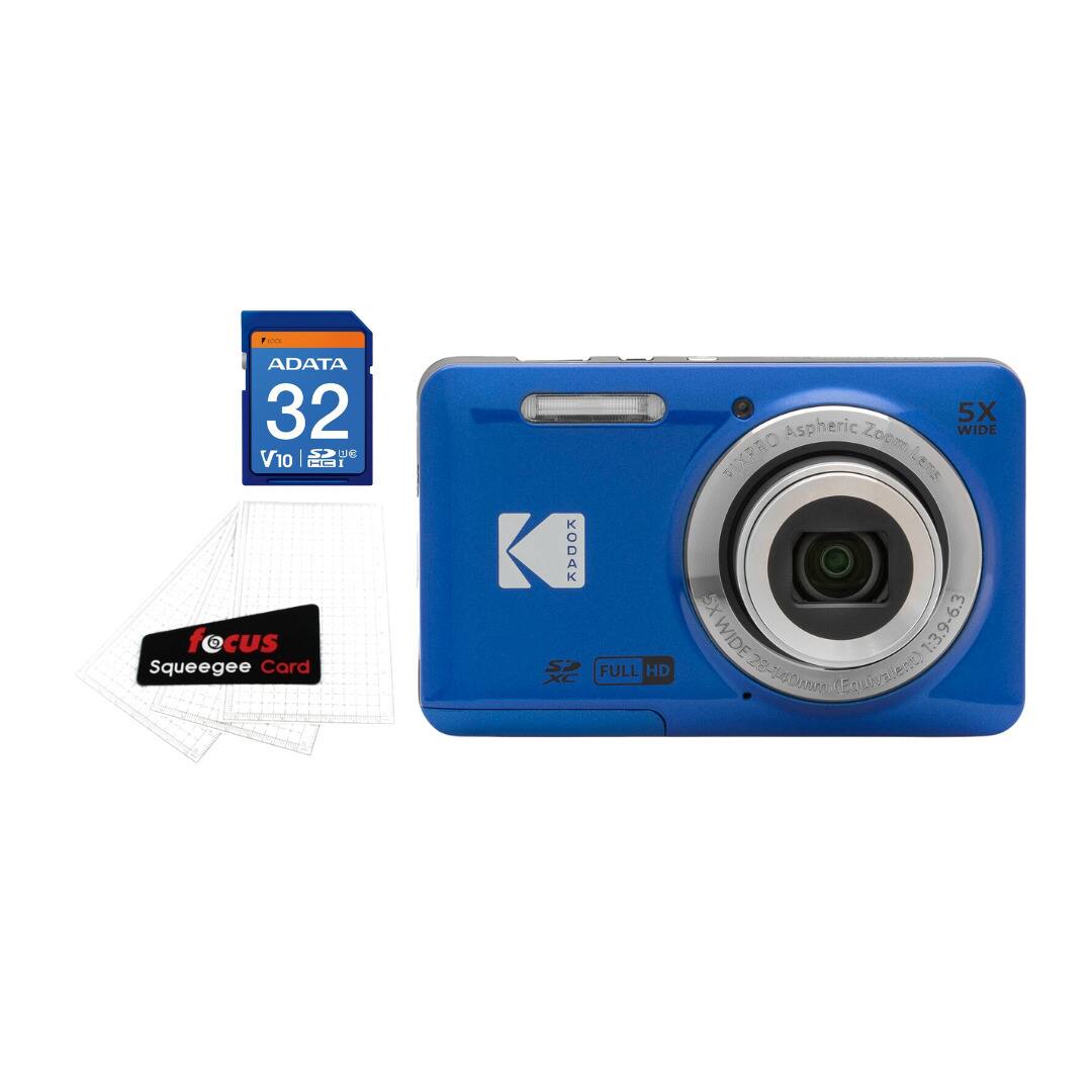 The image features a blue digital camera with a Kodak logo on it. The camera is accompanied by a small card that reads "ADATA 32 GB VOLUME CLASS 10" and a squeegee card. The camera is described as a "XC Full HD 5X Aspheric Zoom WIDE PIXPRO Le7S SX WIDE 7:3.9-6.3 28-6000 (Equvalent)."