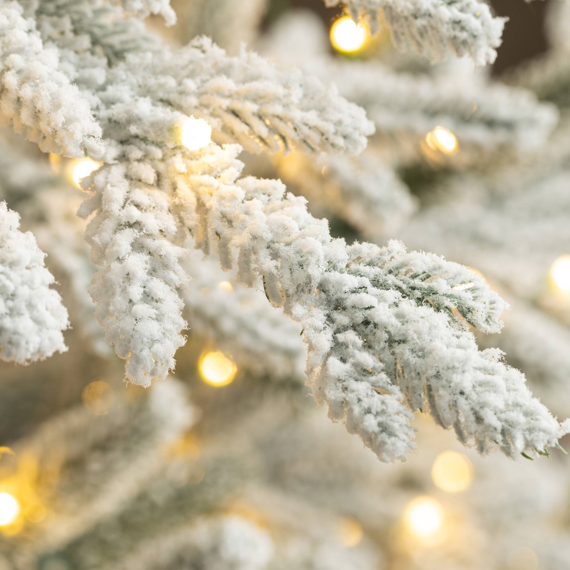 Alt View 10. Glitzhome - 6ft Deluxe Pre-Lit Flocked Slim Fir Artificial Christmas Tree with 300 Lights - White.
