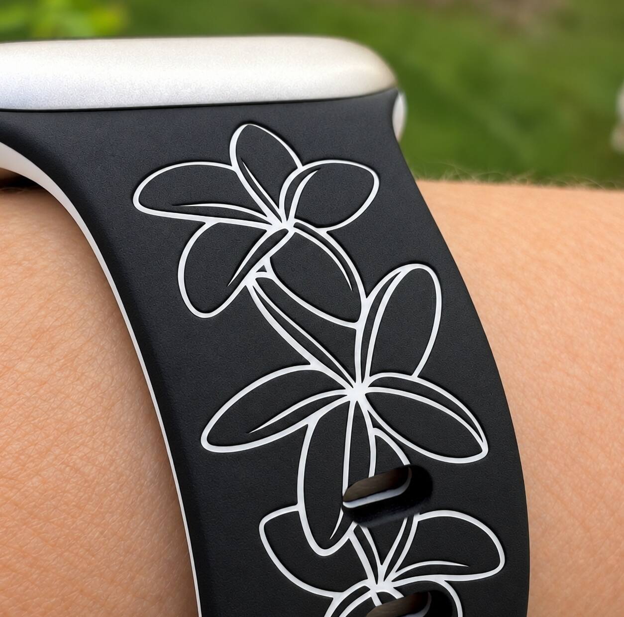 Left. ROXTRO - Black to White Plumeria Engraved Two-Tone Watch Band Apple Watch Compatible SMALL WATCH 38/40/41mm (42mm Series 10 & Up) - Black to White.