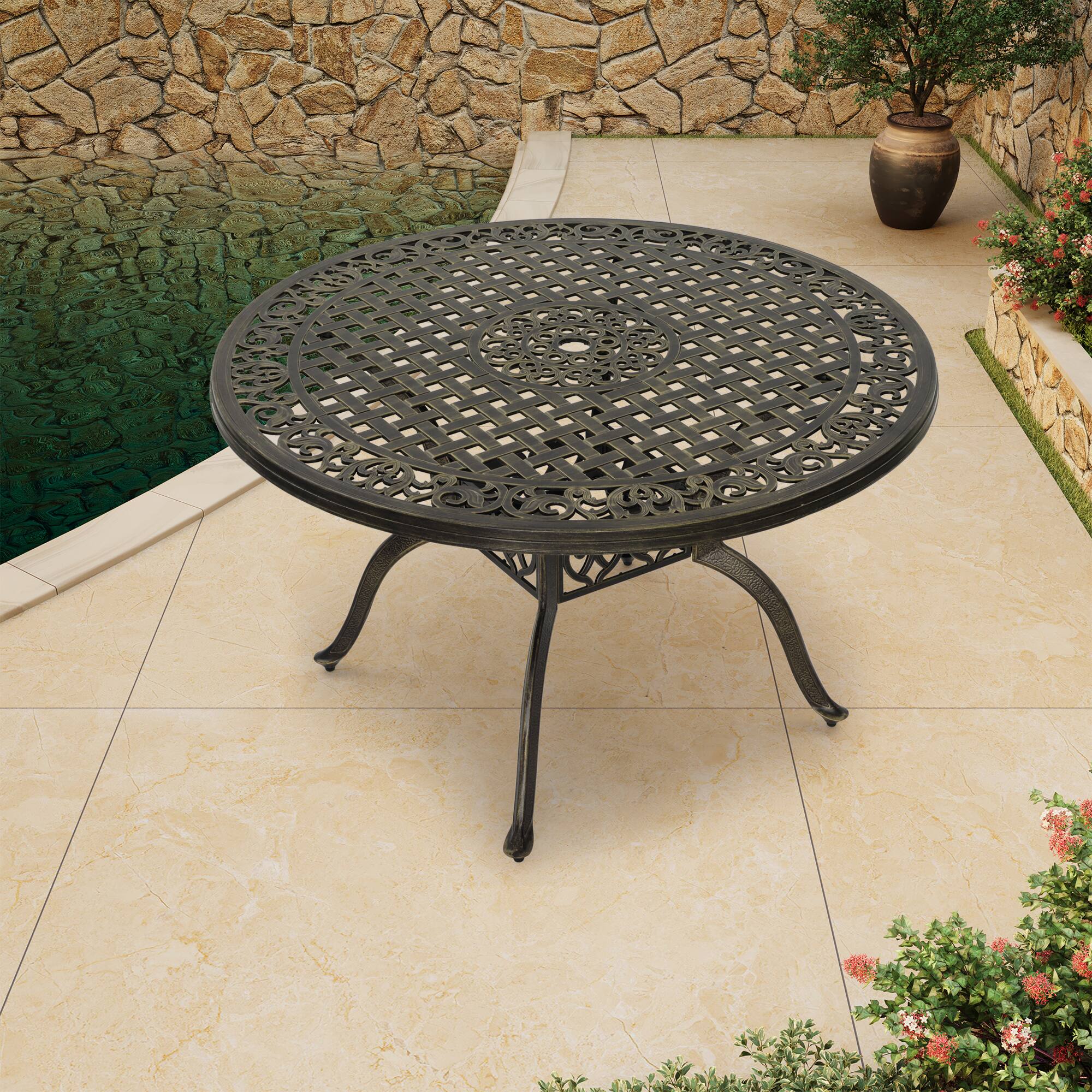 Left. Mondawe - 47" cast aluminum round dining table - Bronze.