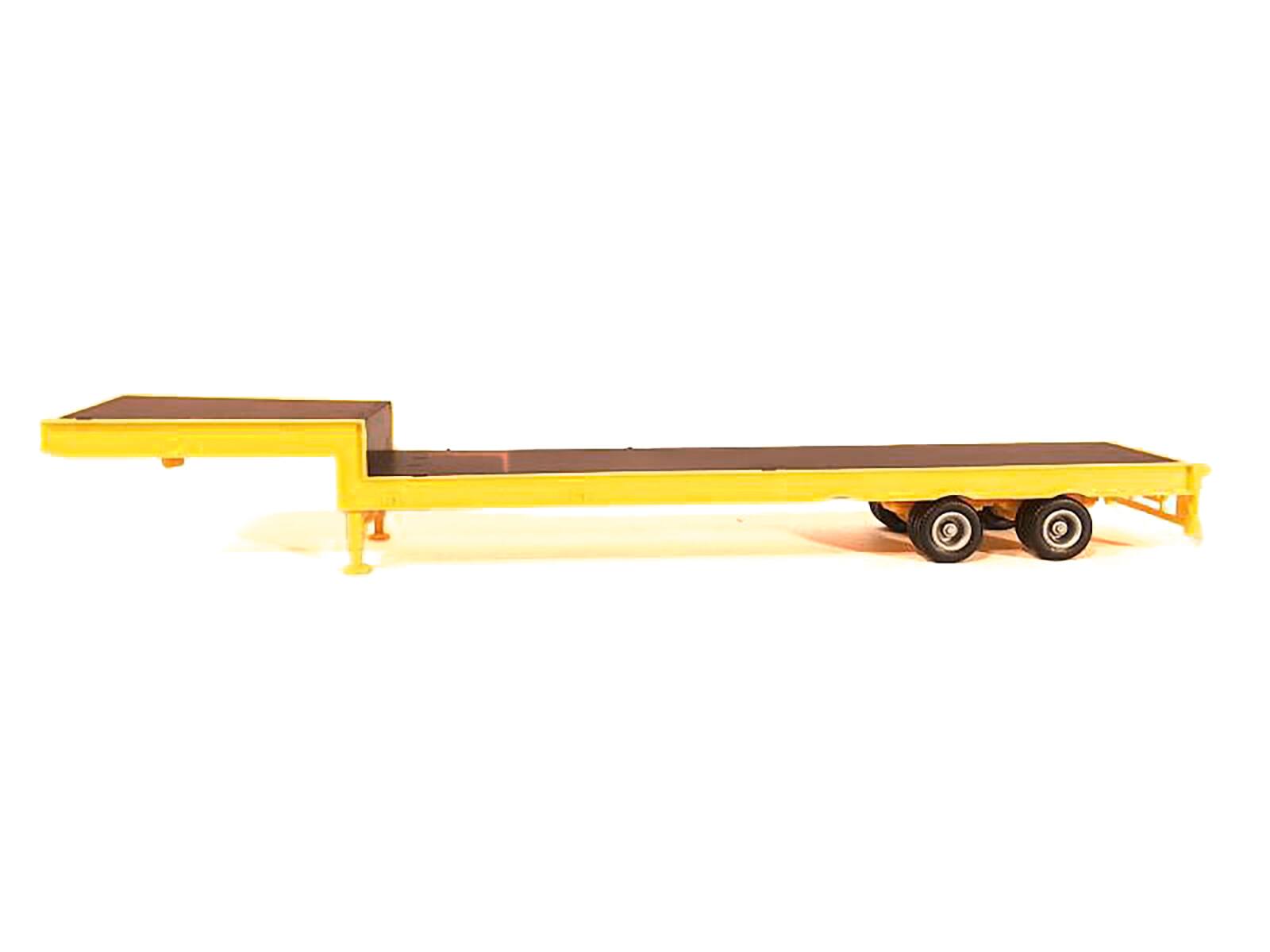 Angle. Promotex - 2-Axle Step Deck Equipment Trailer with Ramps Yellow 1/87 (HO) Plastic Model by Promotex - Yellow.