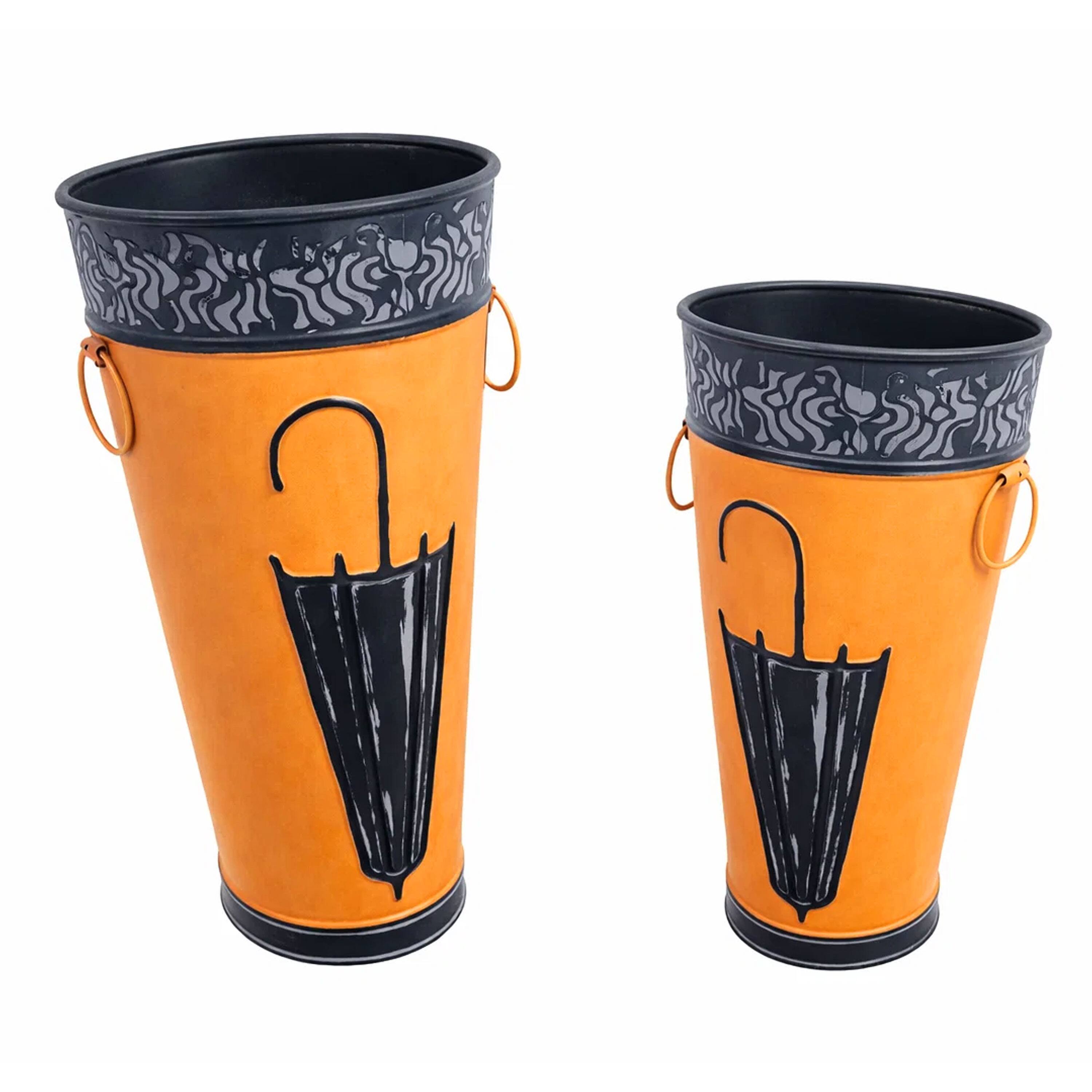 Angle. Manhattan Lane - 21, 16 Inch Metal Umbrella Stands, Black Engraved Artwork, Set of 2, Orange - Brown, Black, White.