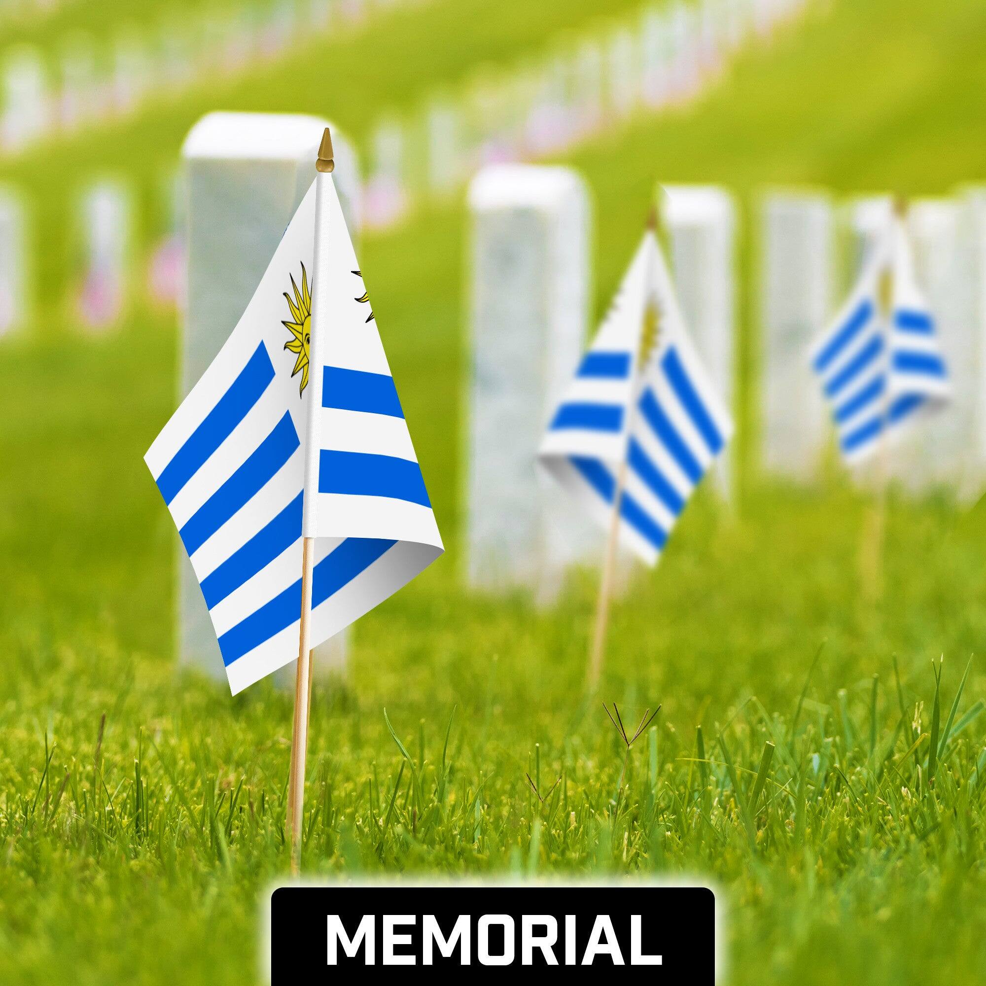 Back. G128 - 12 Pack Handheld Uruguay Stick Flags, 12" x 18", 150D Polyester with Wooden Pole and Gold Spear Tip. - Assorted Colors.