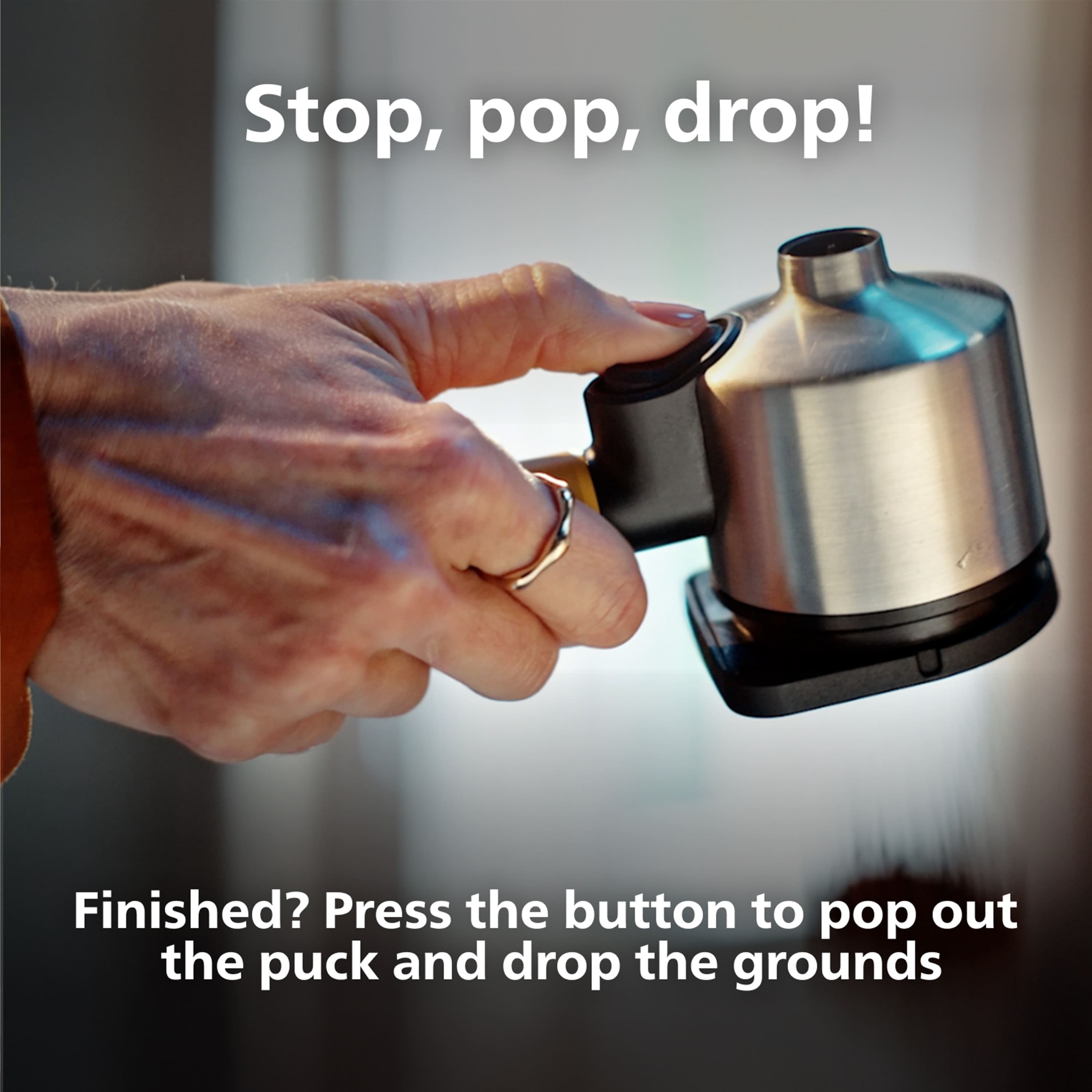 Stop, pop, drop! Finished? Press the button to pop out the puck and drop the grounds.