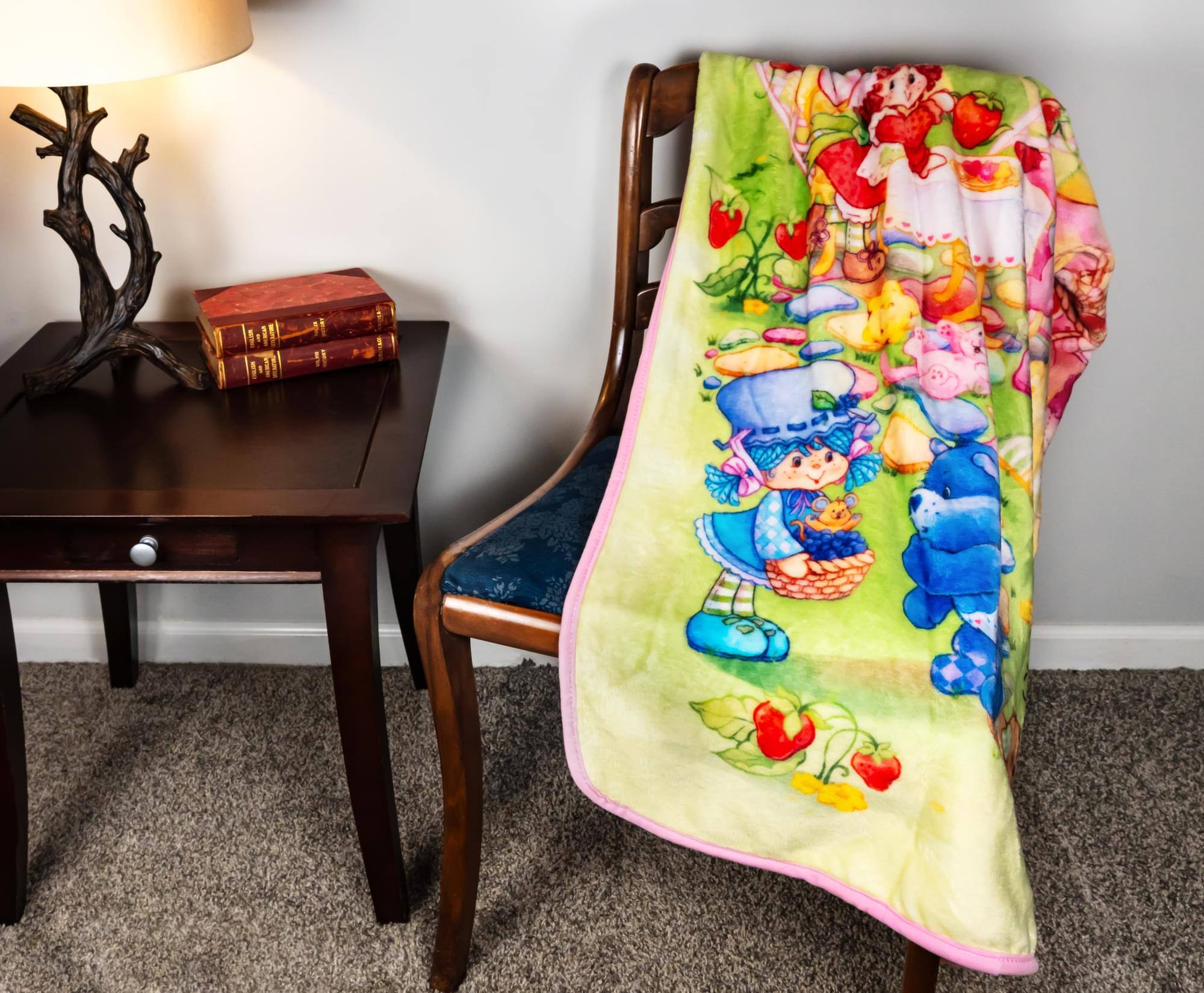 Alt View 2. Silver Buffalo - Care Bears x Strawberry Shortcake Fleece Throw Blanket | 45 x 60 Inches - Multi-Color.