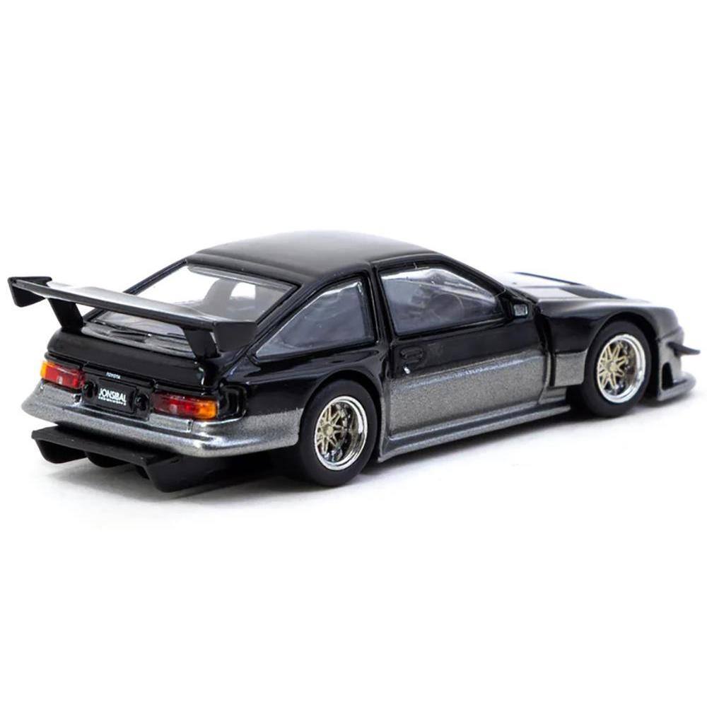 Angle. Tarmac Works - Toyota Sprinter Trueno AE86 Widebody RHD Jonsibal Designworks Black/Gray Metallic Global64 Series 1/64 - Black and Gray Metallic.