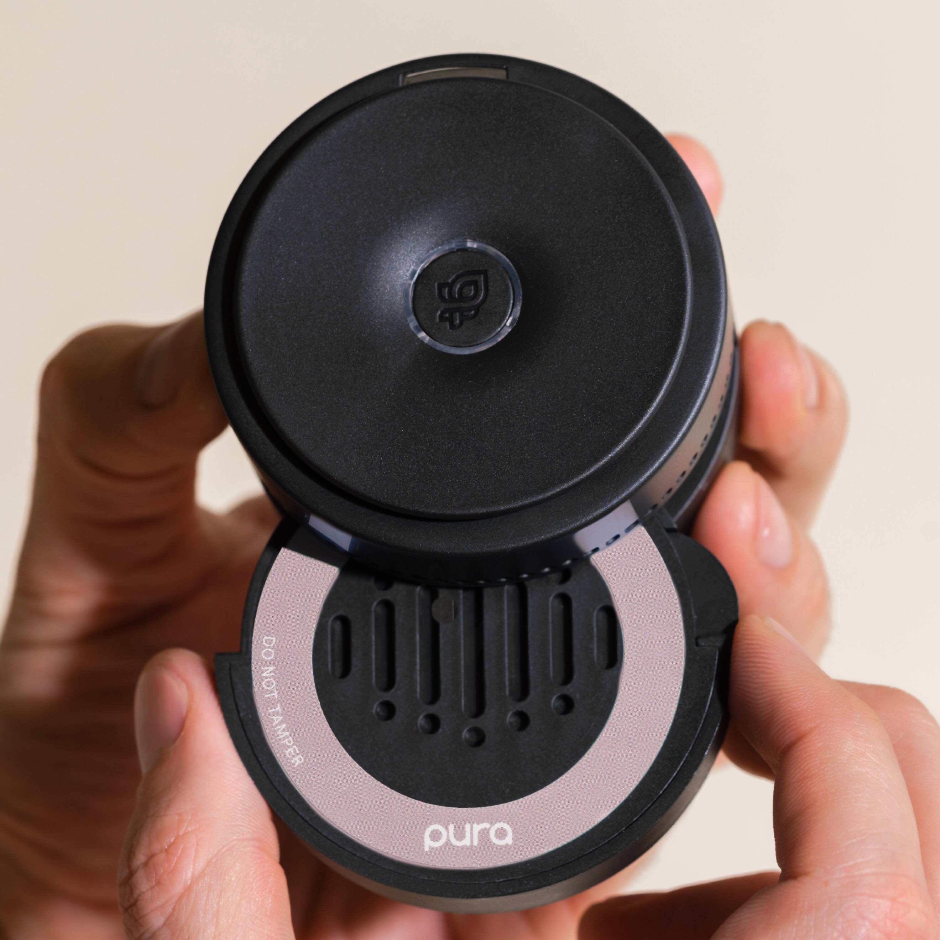 The text on the image is "9 DO NOT TAMPER pura."