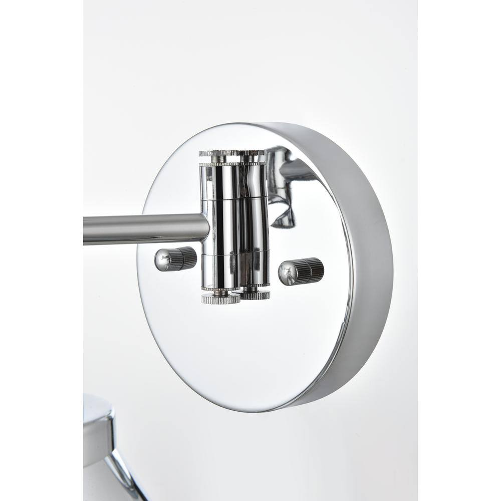Left. Living District - Judson 1 light Chrome swing arm wall sconce - Chrome.