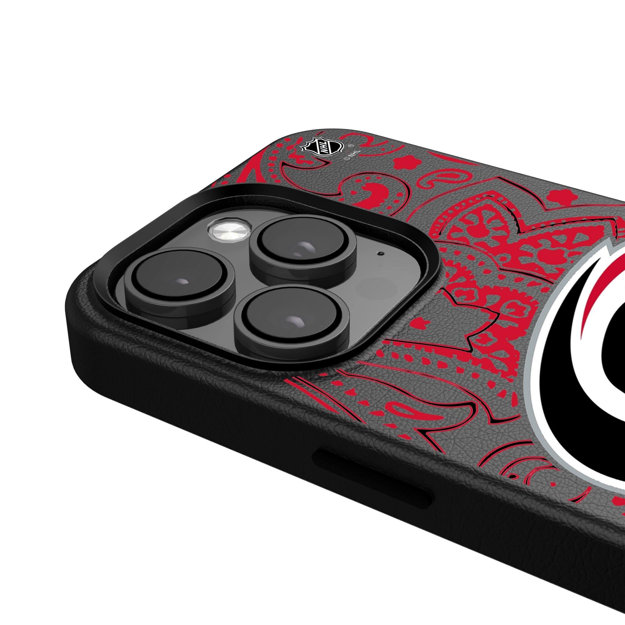 Alt View 3. Keyscaper - Black Carolina Hurricanes Paisley iPhone Magnetic Bump Case - 15 Plus - Black.