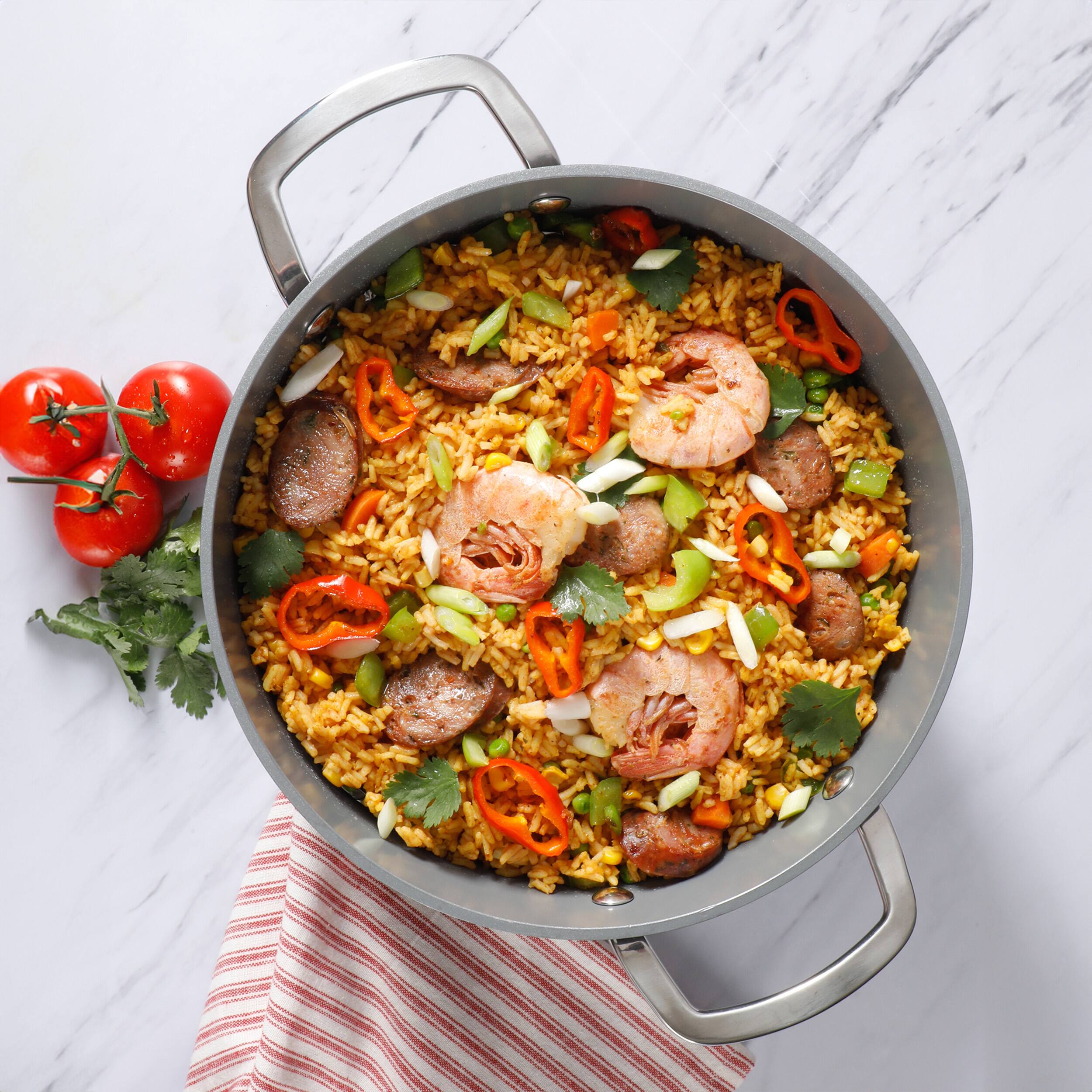 Left. Sur La Table - Sur La Table Angelie 10 Piece Nonstick Ceramic Enameled Aluminum Cookware Set in Matte Brick - Brick.