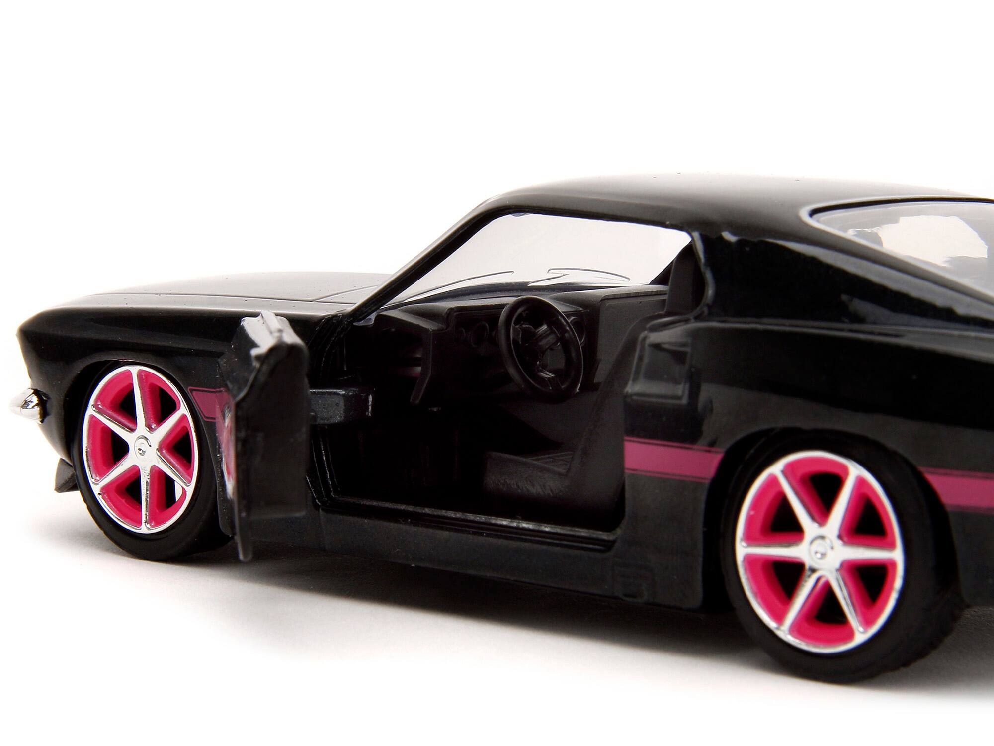 Left. Jada - 1969 Ford Mustang Black Metallic with Pink Stripes and Wheels "Pink Slips" Series 1/32 Diecast Model Car by Jada - Black Metallic With Pink .