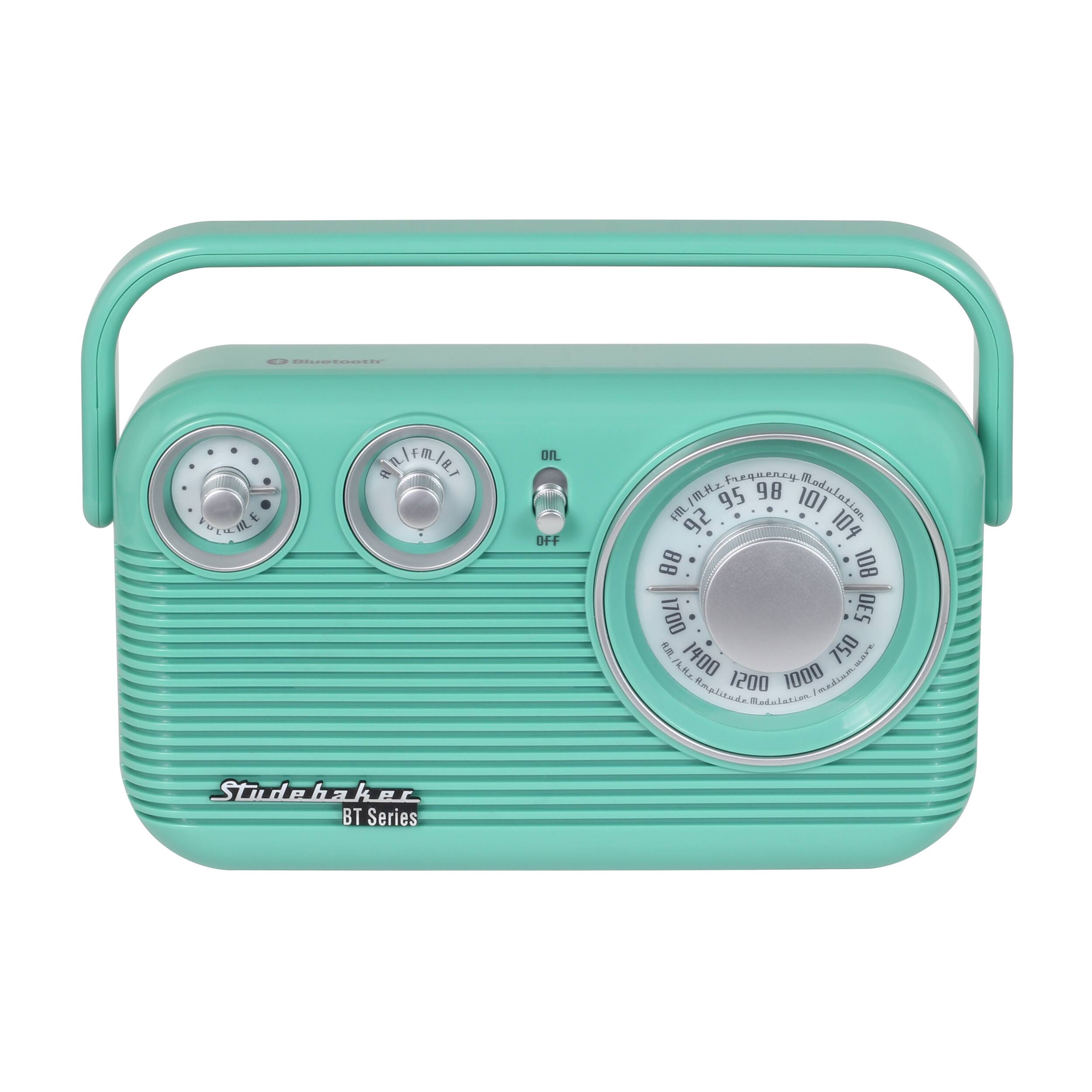 The image features a small, light blue radio with a clock on the front. The radio is made by Studer and is part of the BT series. It has a frequency dial on the front, which allows the user to adjust the frequency to their desired level. The radio is designed to be compact and portable, making it a convenient choice for those who want to listen to their favorite stations on the go.