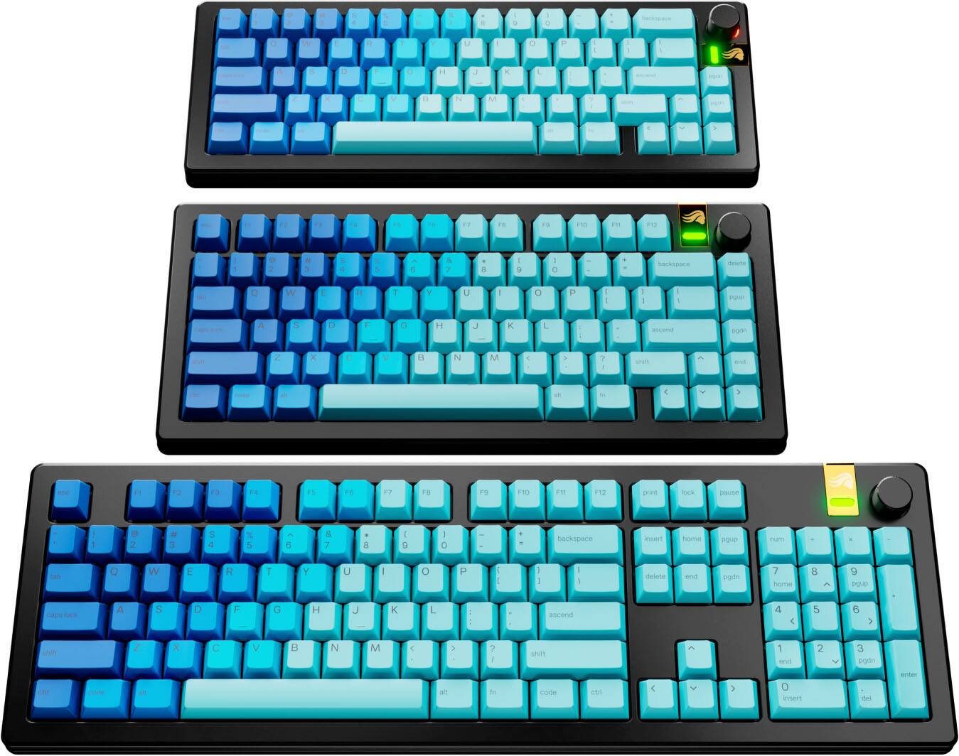 The image shows three different colored keyboards, each with a different color scheme. The keyboards are arranged in a way that allows for easy comparison of their designs and layouts. The colors of the keyboards are blue, green, and black, which are the main colors of the keyboards. The keyboards are placed on a white background, which helps to emphasize the colors and design of the keyboards.