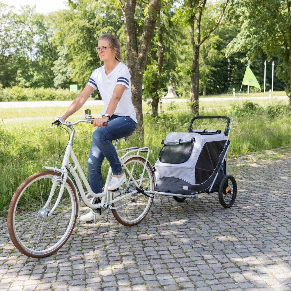 Left. TRIXIE - Quick-Fold Dog Bike Trailer, Carrier for Small Dogs up to 48 lbs, Gray - Silver/Black.